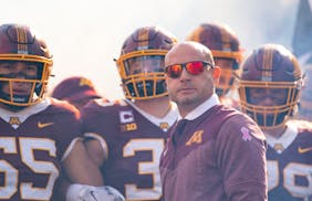 Minnesota Gophers players wait with head coach P.J. Fleck to run out of the tunnel before their game against the Purdue Boilermakers Saturday, Oct. 1,