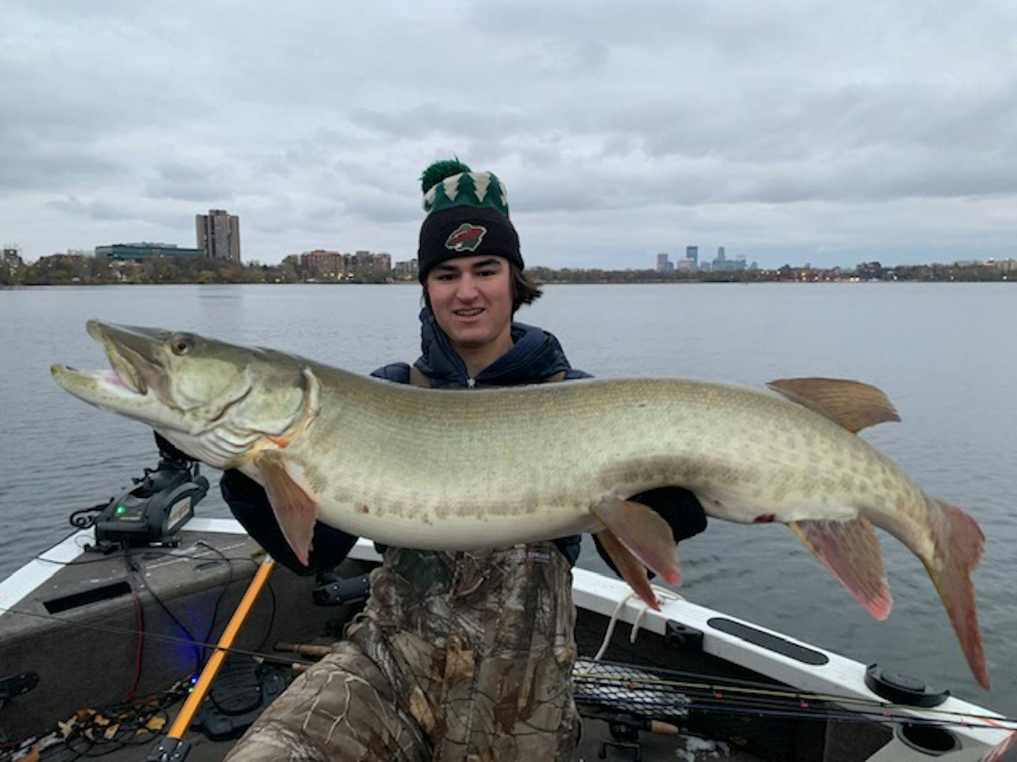 Julian Glenn of Minneapolis, lifted his 50-inch musky. He'd been out fishing for bass Oct. 23 on Bde Maka Ska. "It was surreal," the young angler said. Credit: Submitted photo