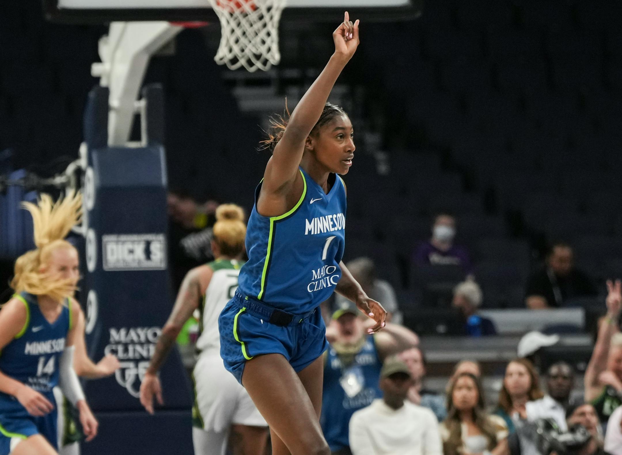 Minnesota Lynx guard Diamond Miller (1) celebrates scoring a three-point shot in the first half. The Minnesota Lynx hosted the Seattle Storm on Tuesday, June 27, 2023 at the Target Center in Minneapolis.
