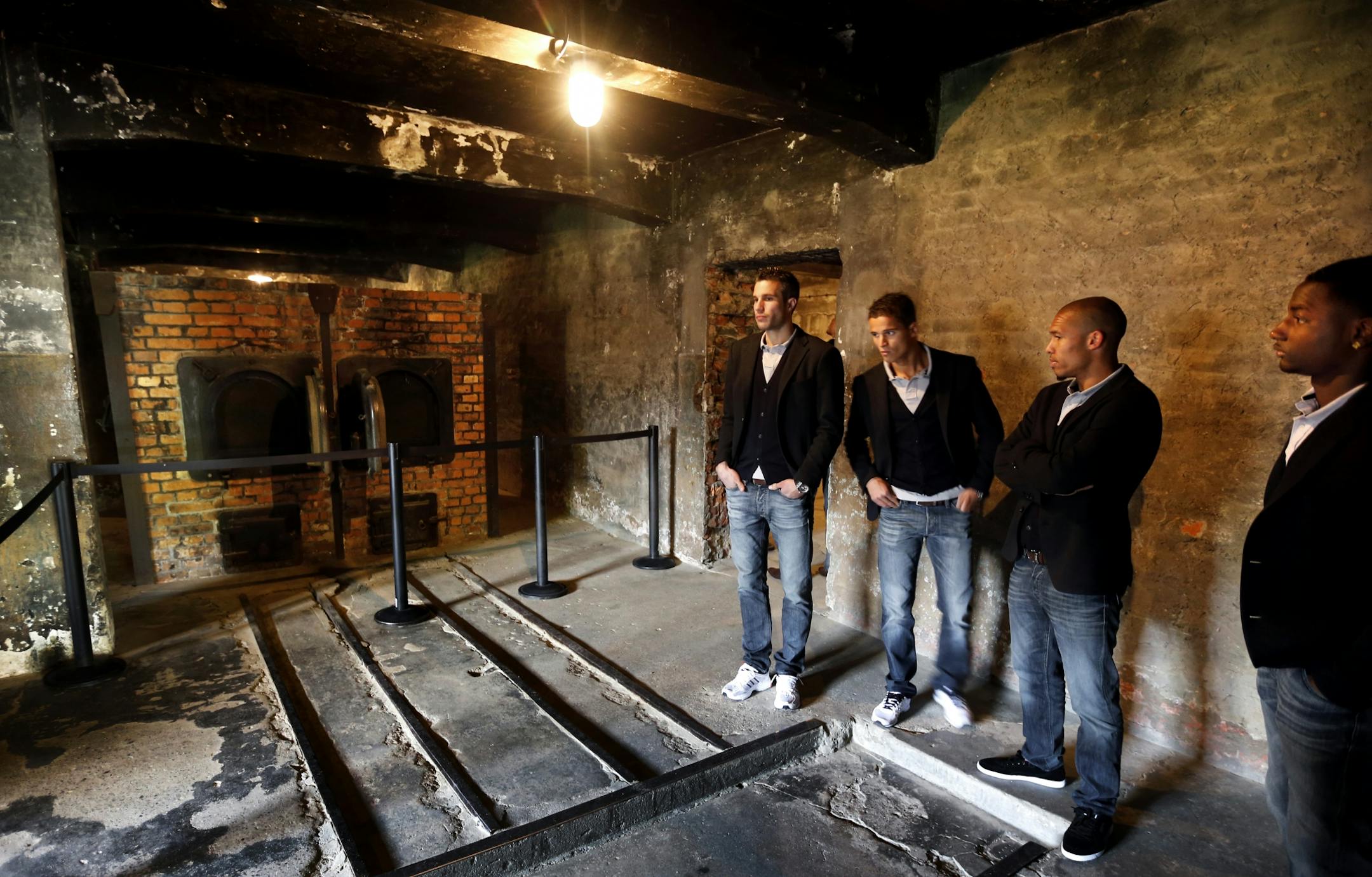 Visitors tour the Nazi death camp Auschwitz