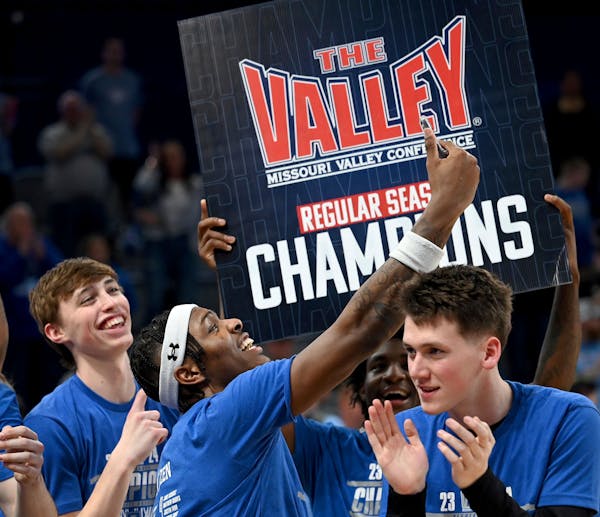 Indiana State players celebrate their Missouri Valley Conference regular season title on March 3.