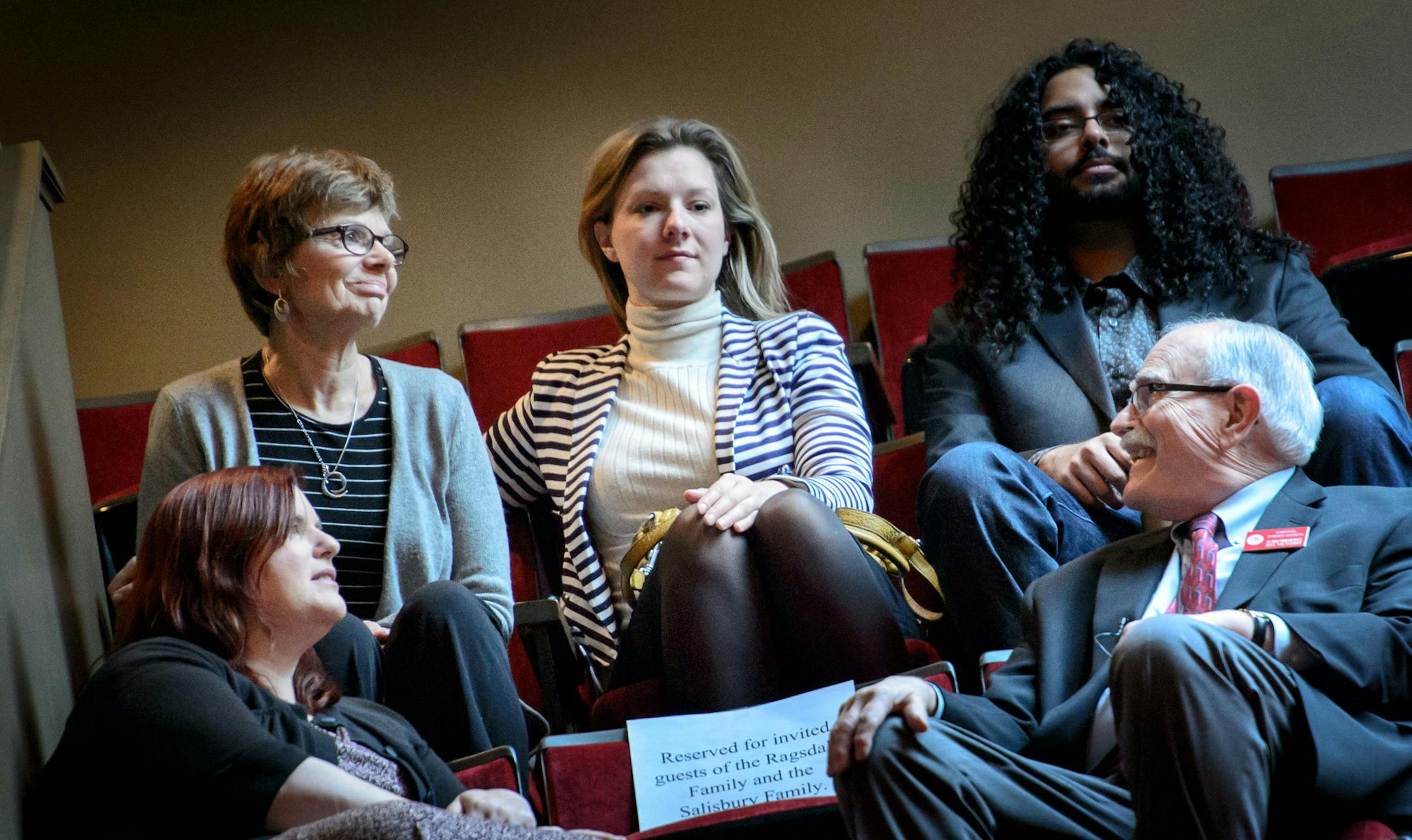 Jim Ragsdale's widow Mary and his daughter Catherine, center talked with Bill Salisbury, right and his daughter Rachael, left in the Senate Gallery. ] GLEN STUBBE * GSTUBBE@STARTRIBUNE.COM Friday, February 2, 2015 Reporters Jim Ragsdale and Bill Salisbury were honored from the Minnesota Senate floor today by Sen. Richard Cohen and Majority Leader Tom Bakk.
