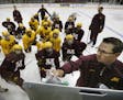 Minnesota coach Brad Frost go over plays with his team during practice.The University of Minnesota women's hockey team practiced Tuesday September 30 