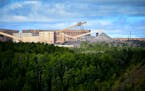 This photo taken Aug. 26, 2014, shows the Minntac taconite mine plant in Mountain Iron, Minn.