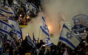 People protest against Israeli Prime Minister Benjamin Netanyahu's government and call for the release of hostages held in the Gaza Strip by the Hamas