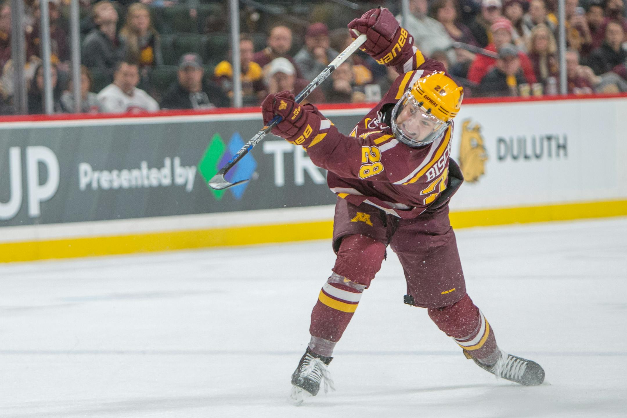 Minnesota Gophers defenseman Jake Bischoff (28) shoots the puck, teammate Brent Gates Jr. (10) would burry the rebound with 39 seconds left in the game. Gophers fall to UMD Bulldogs 3-2. [ Special to Star Tribune, photo by Matt Blewett, Matte B Photography, matt@mattebphoto.com, January 27, 2017, Minnesota Golden Gophers, University of Minnesota Duluth (UMD) Bulldogs, North Star College Cup, Xcel Energy Center, St. Paul, Minnesota, SAXO 20046998A UPUK012817