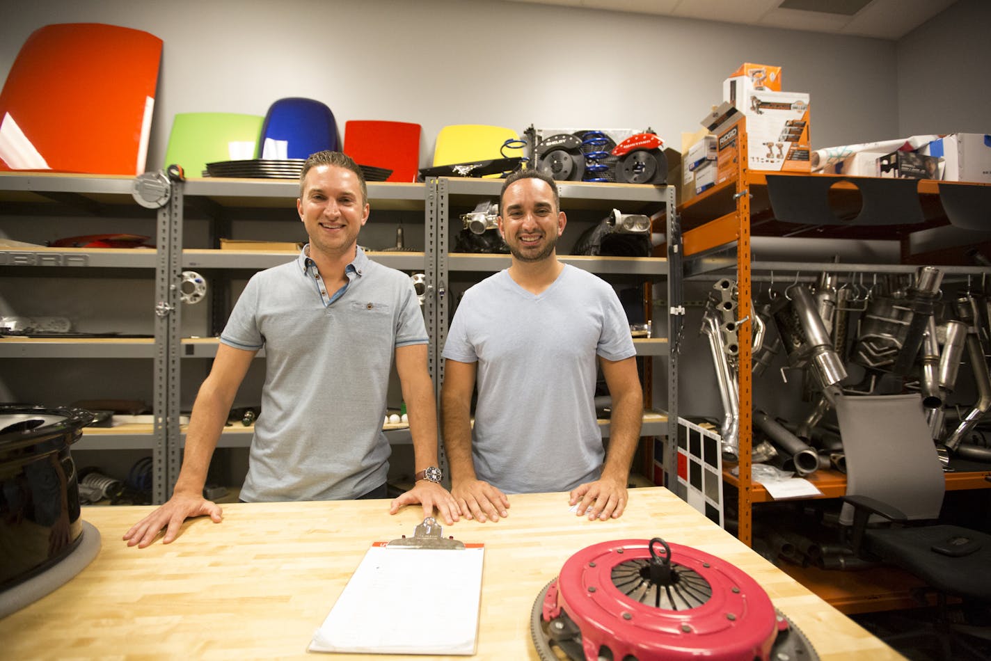 Steve, right, and Andrew Voudouris, founders of Turn5, an automotive e-commerce business, in their headquarters in Malvern, Pa., on June 14, 2017. The Voudouris brothers launched the business in their parents' basement in 2004. (Margo Reed/Philadelphia Inquirer/TNS) ORG XMIT: 1206599