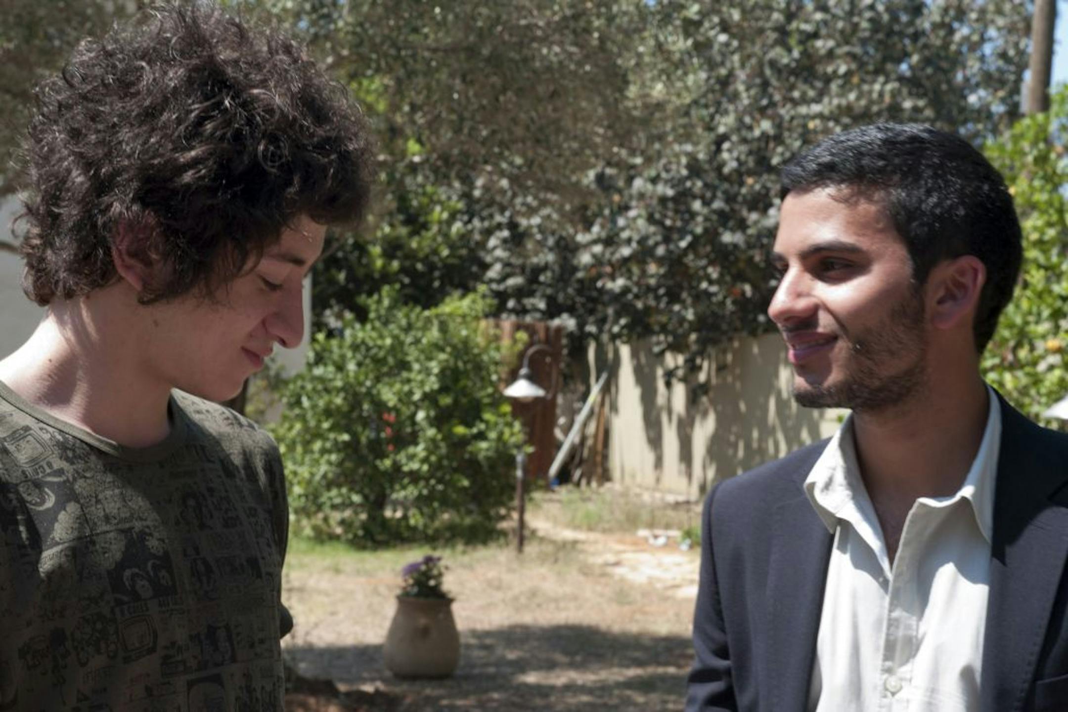 In an undated handout photo, Jules Sitruk, left, and Mehdi Dehbi in a scene from "The Other Son," a 2012 film directed by Lorraine Levy. In the film, psychological and political consequences arise when children living along the Palestinian-Israeli divide are switched at birth. (Cohen Media Group via The New York Times) -- NO SALES; FOR EDITORIAL USE ONLY WITH STORY SLUGGED SON FILM REVIEW BY A.O. SCOTT. ALL OTHER USE PROHIBITED. --