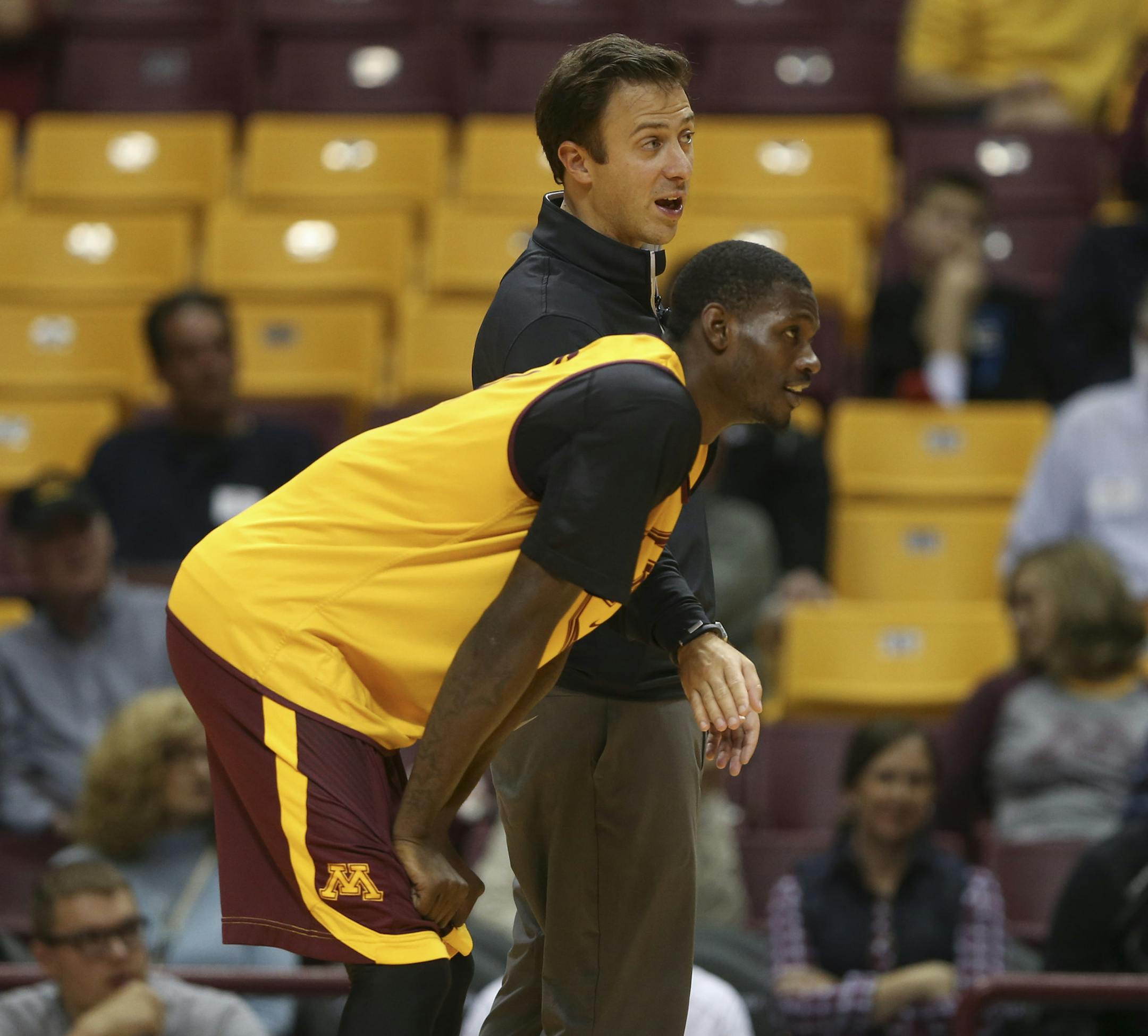 Gophers head coach Richard Pitino spoke with Carlos Morris during the intrasquad scrimmage Sunday afternoon. ] JEFF WHEELER ‚Ä¢ jeff.wheeler@startribune.com The Gopher men's basketball team held an intrasquad scrimmage Sunday afternoon, October 26, 2014 at Williams Arena.
