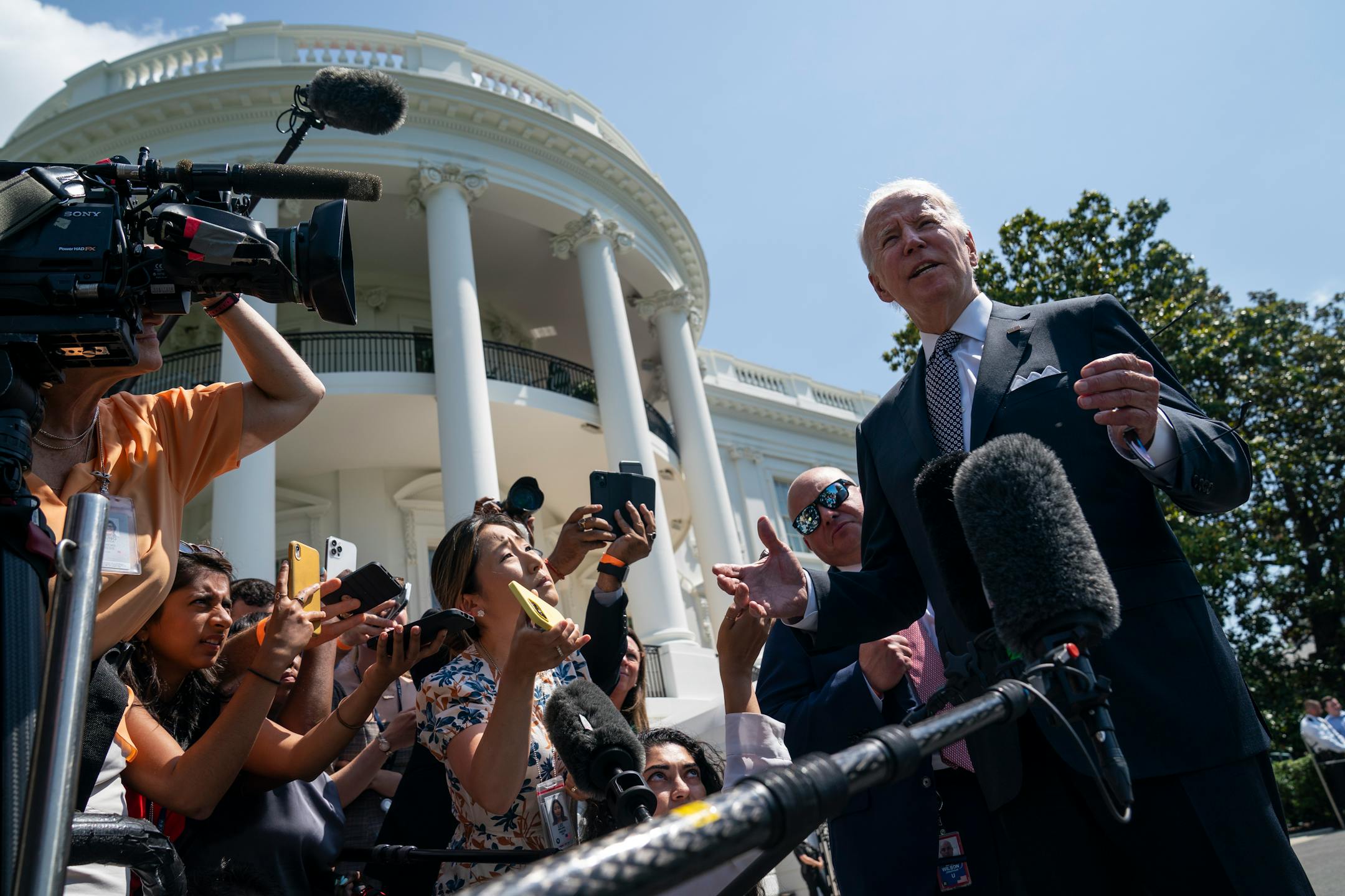President Joe Biden talks to reporters before boarding Marine One on the South Lawn of the White House, Friday, June 17, 2022, in Washington. (AP Photo/Evan Vucci)