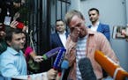 Prominent Russian investigative journalist Ivan Golunov, cries as he leaves a Investigative Committee building in Moscow, Russia, Tuesday, June 11, 20