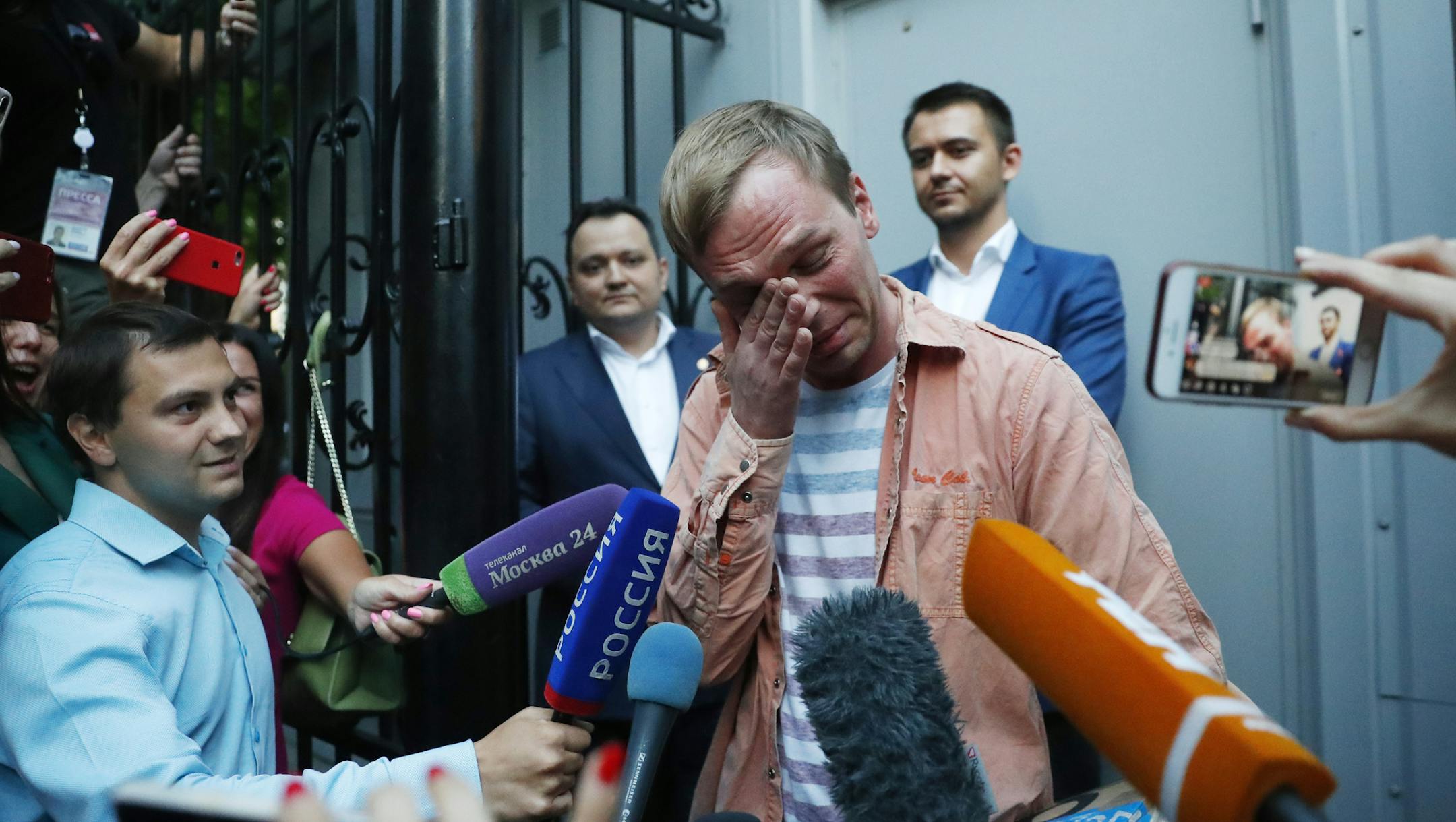 Prominent Russian investigative journalist Ivan Golunov, cries as he leaves a Investigative Committee building in Moscow, Russia, Tuesday, June 11, 2019. In a surprising turnaround, Russia's police chief on Tuesday dropped all charges against a prominent investigative reporter whose detention sparked public outrage and promised to go after the police officers who tried to frame the journalist as a drug-dealer. (AP Photo/Pavel Golovkin)