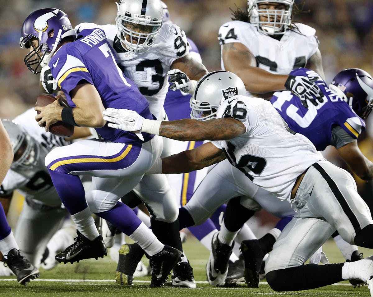 Minnesota Vikings quarterback Christian Ponder (7) was sacked by Ricky Lumpkin (93) and Justin Cole (46) in the fourth quarter. ] CARLOS GONZALEZ cgon