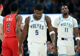 Minnesota Timberwolves guard Anthony Edwards (5) walks back to the bench dejected after a second half timeout against the New Orleans Pelicans Wednesd