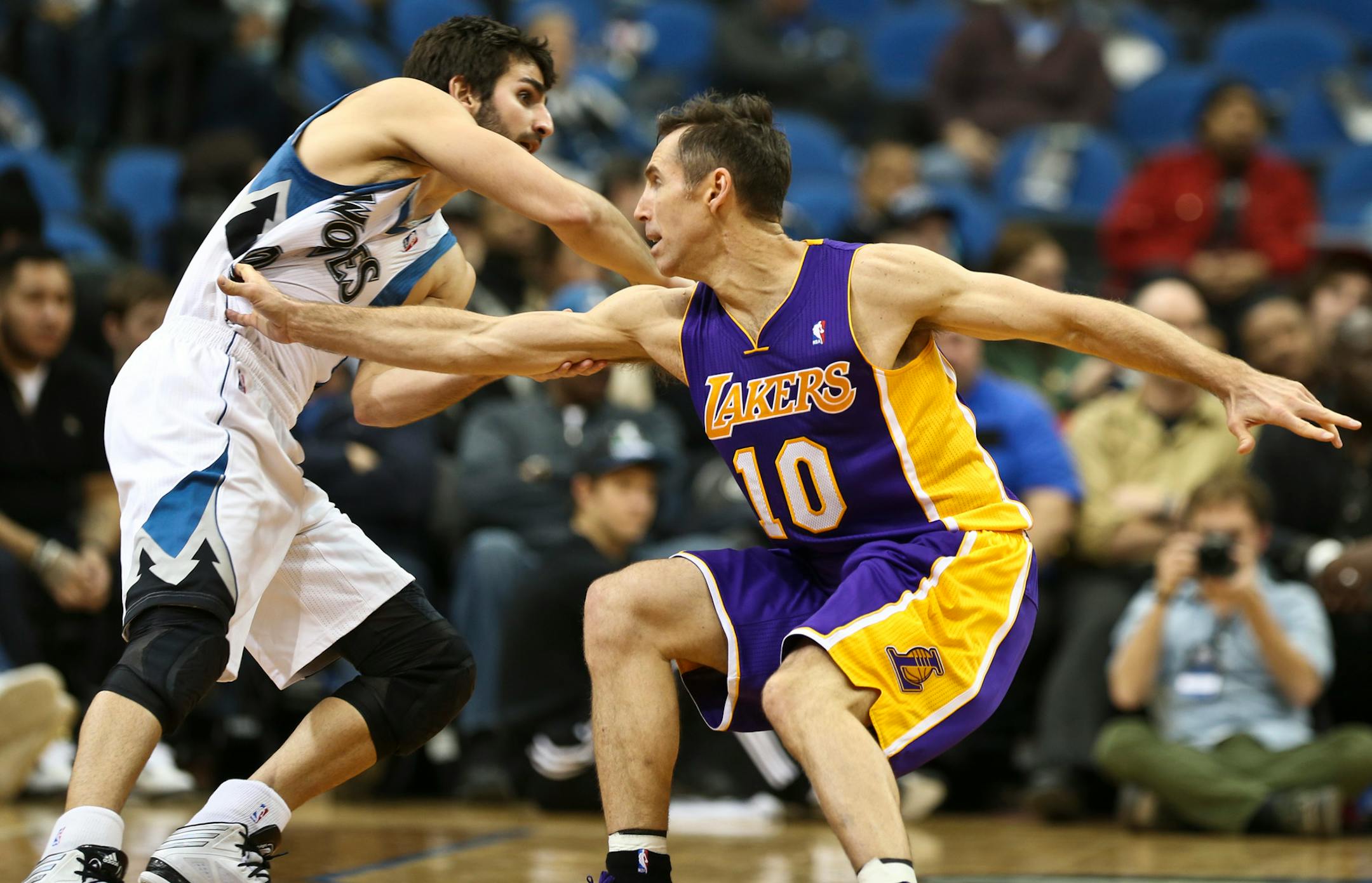 Timberwolves' Ricky Rubio tried to scramble past Lakers' Steve Nash's guard in the second half during an NBA game between the Minnesota Timberwolves and the L.A. Lakers at the Target Center on Tuesday, February 4, 2014. ] (RENEE JONES SCHNEIDER reneejones@startribune.com)