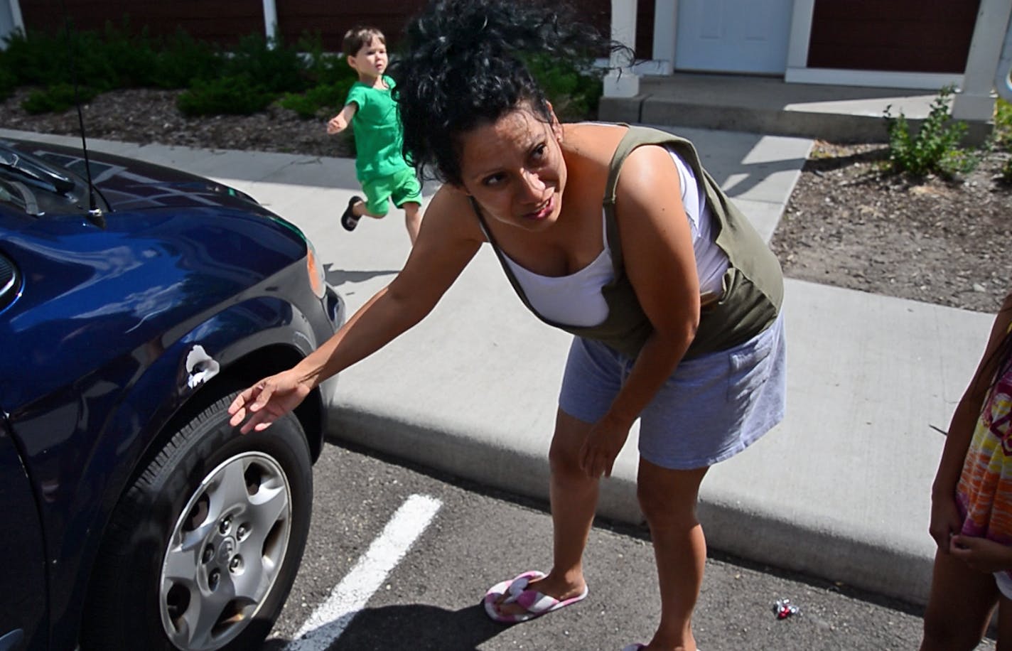 Shooting at a Burnsville town home left one dead and one injured. Victims drove to an Eagan superamerica gas station.The shooting scene investigation spread throughout the Burnsville neighborhood where 2 people were shot in the 2100 block of 117th St. Mara Marin had her car shot up just outside her town home, her neighbor next door had a bullet come through her home. ] Richard.Sennott@startribune.com Richard Sennott/Star Tribune Burnsville, MinnesotaTuesday 8/13/13) ** (cq)