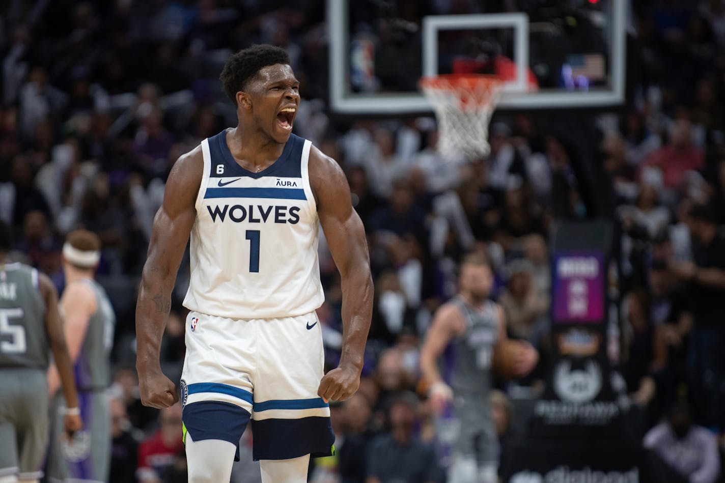 Minnesota Timberwolves guard Anthony Edwards reacts to a score as the Sacramento Kings ask for a timeout during the second half in an NBA basketball game in Sacramento, Calif., Saturday, March 4, 2023. The Timberwolves won 138-134. (AP Photo/José Luis Villegas)