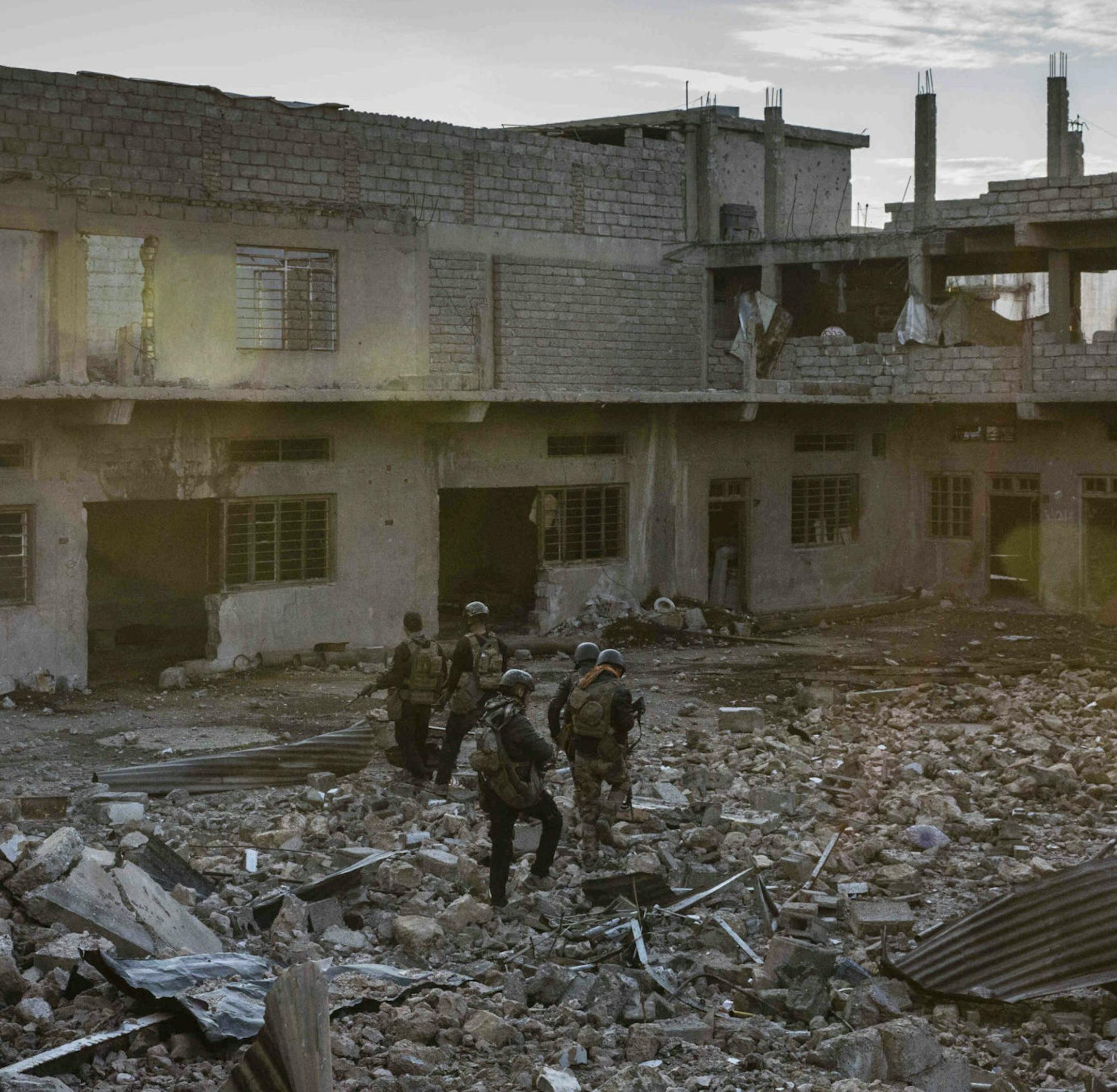 The Weekly -- Gallagher Effect -- Episode 130 -- THE WEEKLY has obtained hours of exclusive videos, including confidential interviews with Eddie GallagherÕs fellow Navy SEALs, that shed new light on the war-crimes case that has created an extraordinary clash between the Navy and President Trump. Iraqi special forces soldiers move through a destroyed building on an early morning operation to clear the last remaining pockets held by ISIS in the Mawsil al Jadidah neighborhood of west Mosul. (P