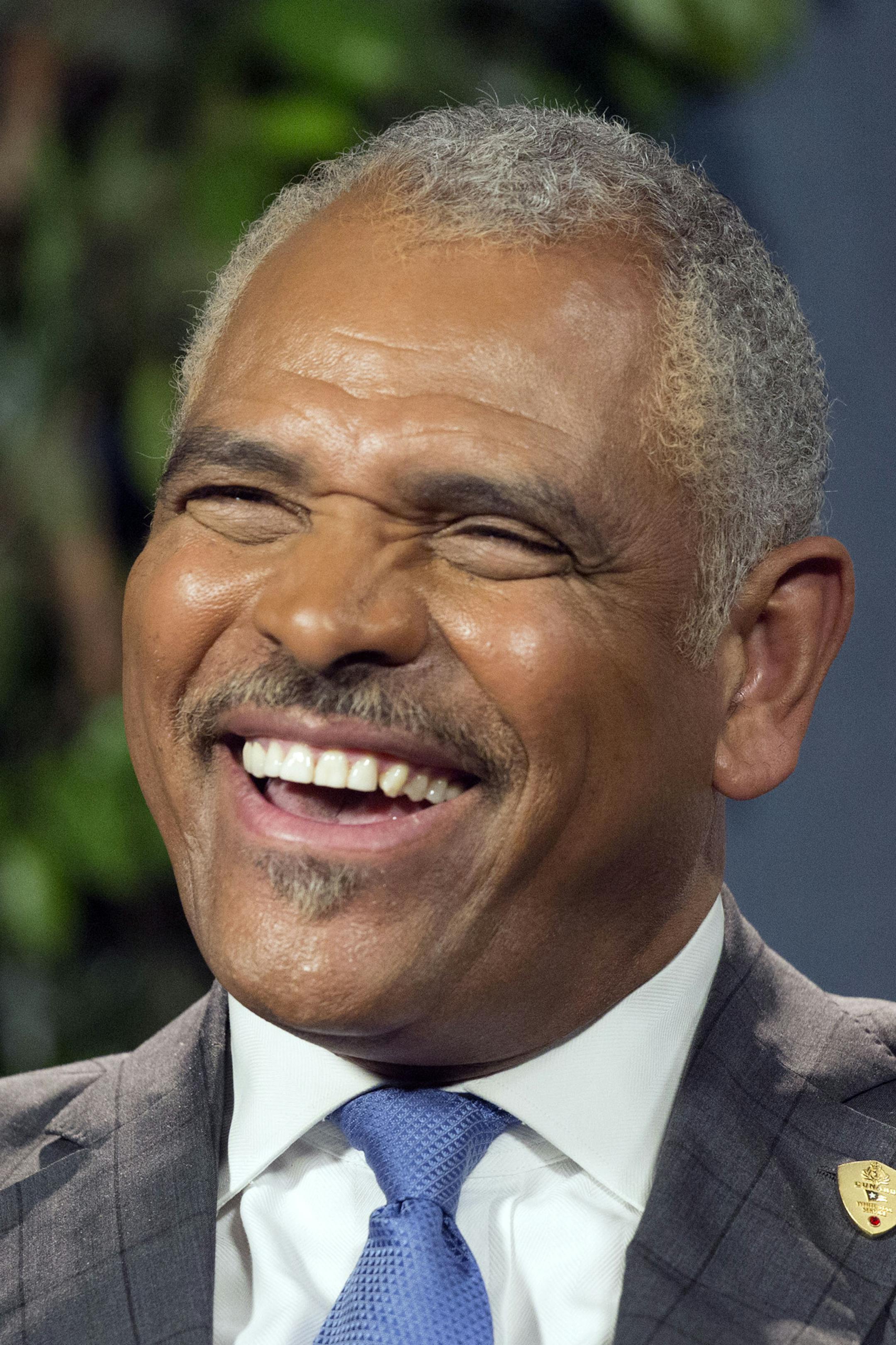 Arnold Donald, president and CEO of Carnival Corp., talks during an interview, Tuesday, July 7, 2015 in New York. Starting in May 2016, Carnival Corp. plans to offer trips from Miami to the Caribbean island nation, the company announced Tuesday. Carnival says it would become the first American cruise company to visit Cuba since the 1960 trade embargo. (AP Photo/Mark Lennihan)