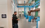 Derek Cavanaugh, an Elko New Market public works maintenance employee, monitored the pipe gallery in the city’s water treatment facility in December