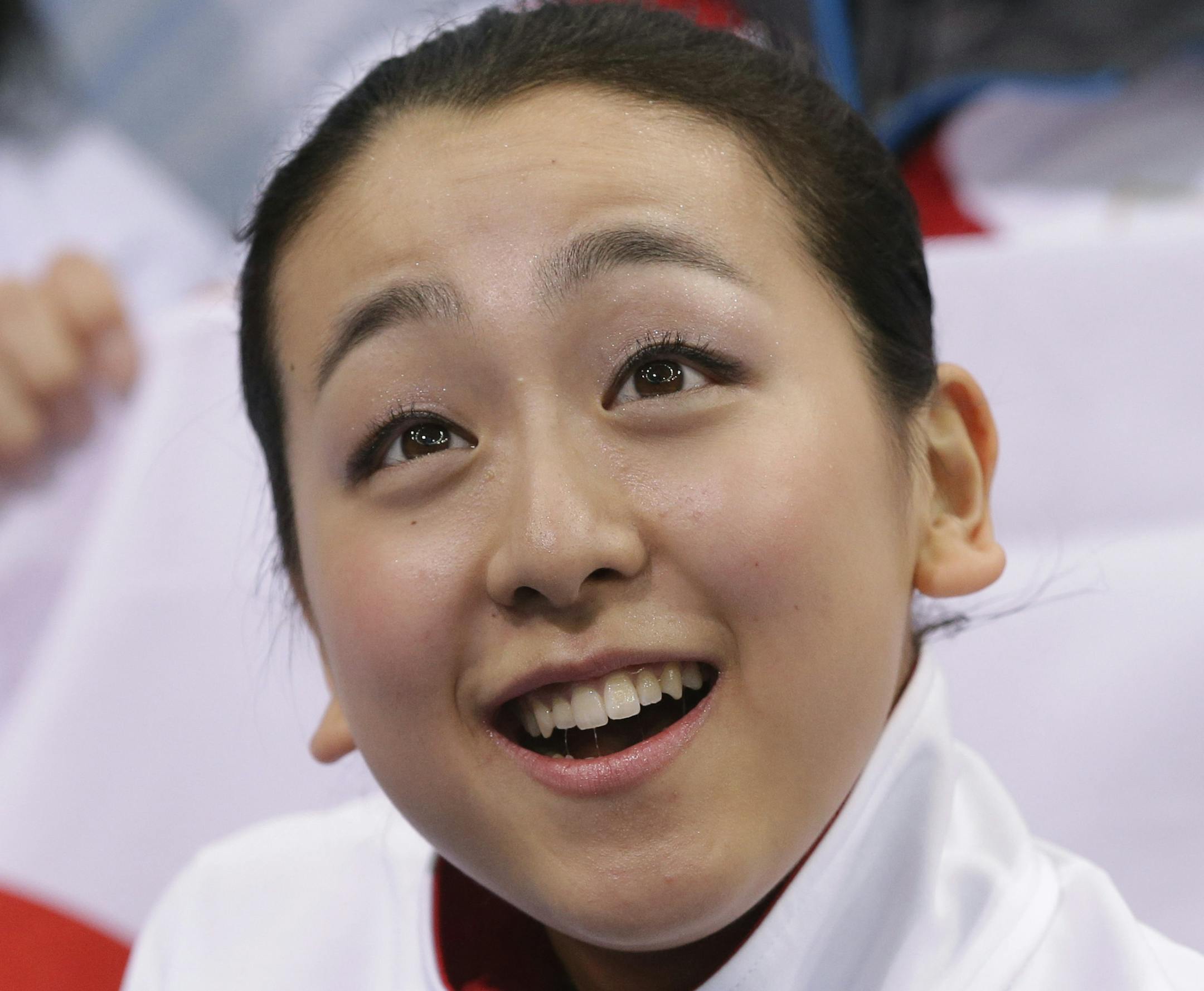 Mao Asada of Japan waits for her results after competing in the women's team short program figure skating competition at the Iceberg Skating Palace during the 2014 Winter Olympics, Saturday, Feb. 8, 2014, in Sochi, Russia. (AP Photo/Darron Cummings, Pool)
