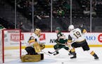 Vegas goaltender Marc-Andre Fleury kicked out a shot by Wild left wing Kirill Kaprizov