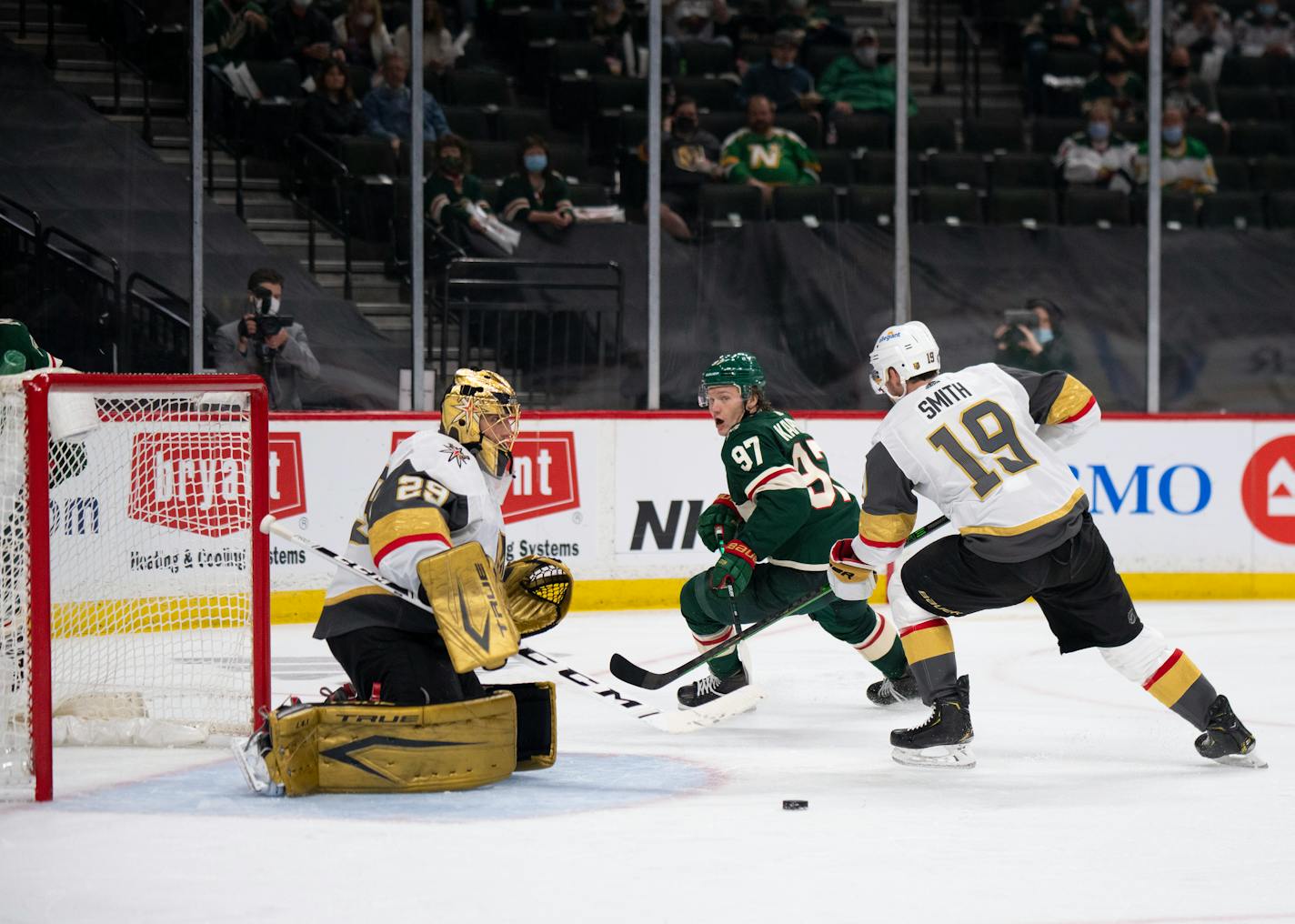 Vegas goaltender Marc-Andre Fleury kicked out a shot by Wild left wing Kirill Kaprizov