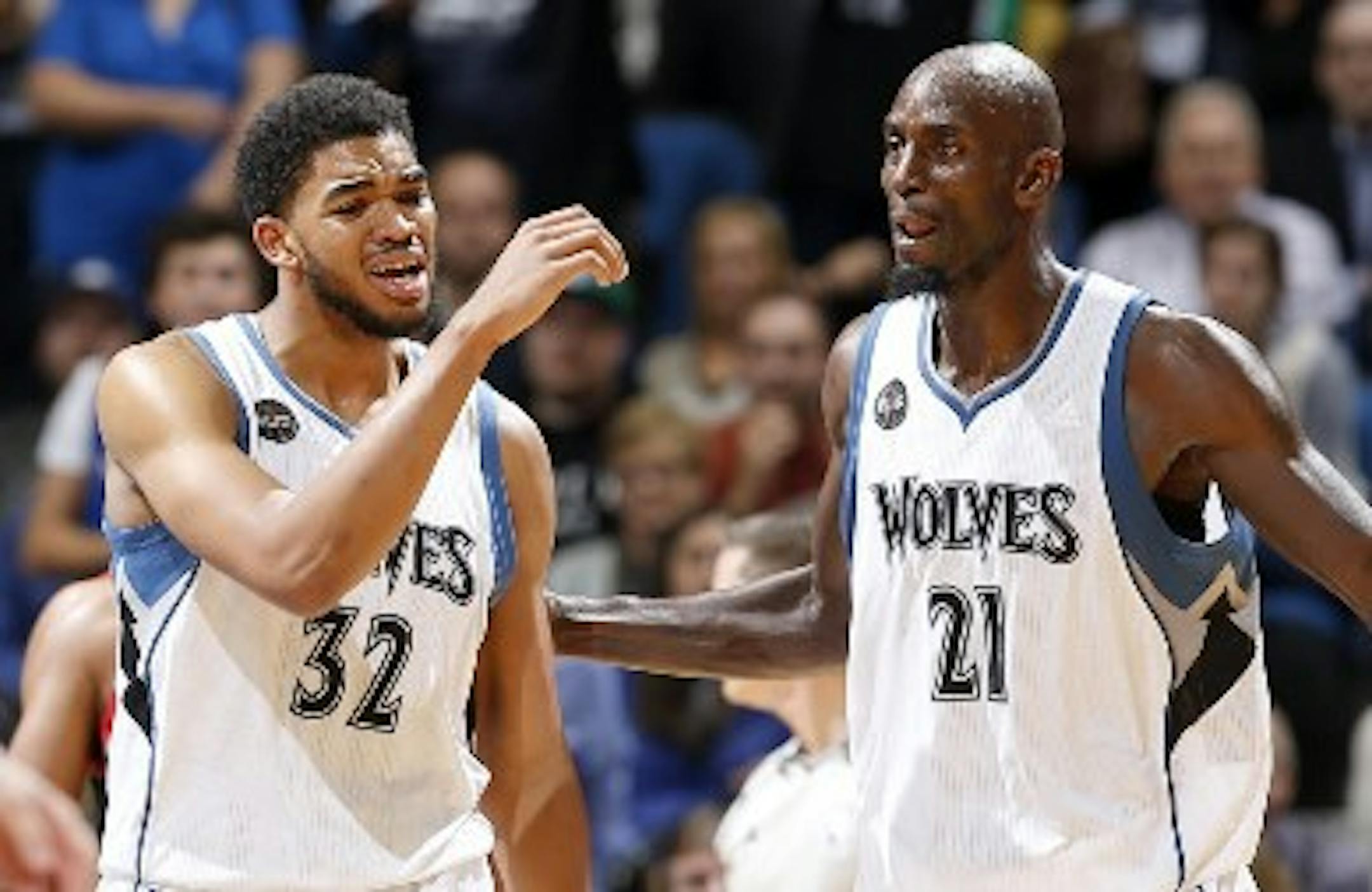 Karl-Anthony Towns, left, and Kevin Garnett.