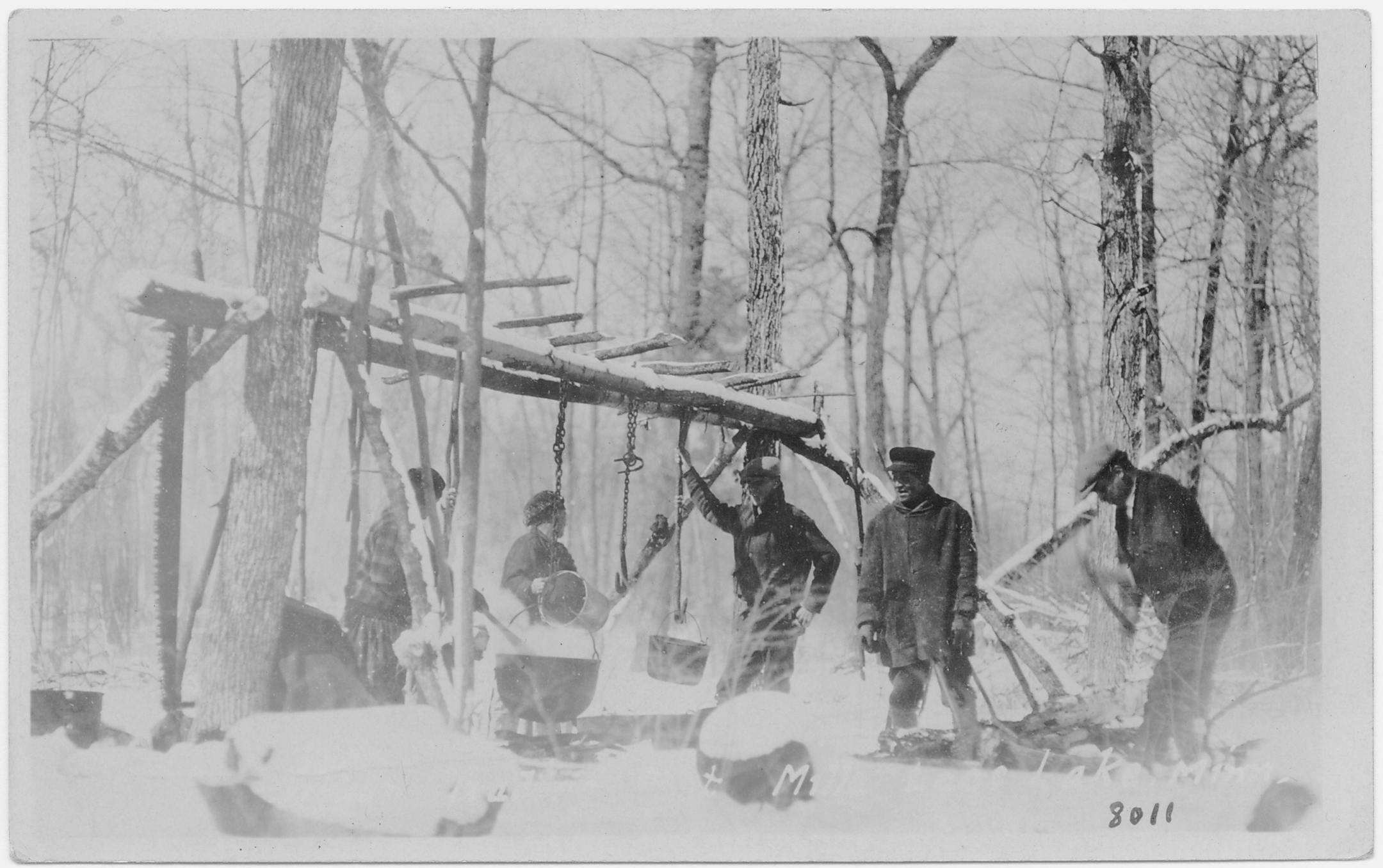 Indians boiling sap for maple syrup, Mille Lacs. Circa 1925