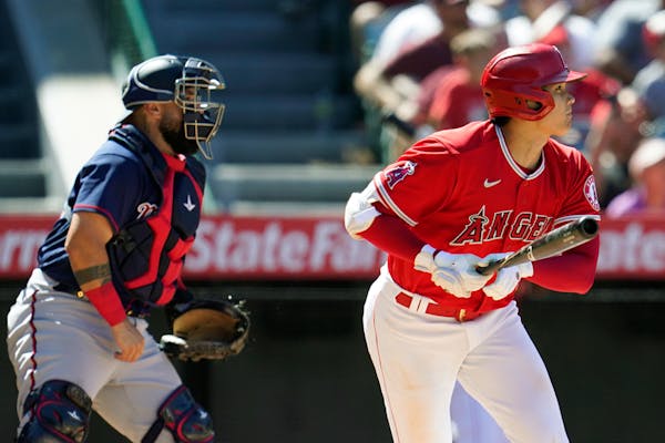 Los Angeles Angels' Shohei Ohtani follows through on his RBI single Sunday.