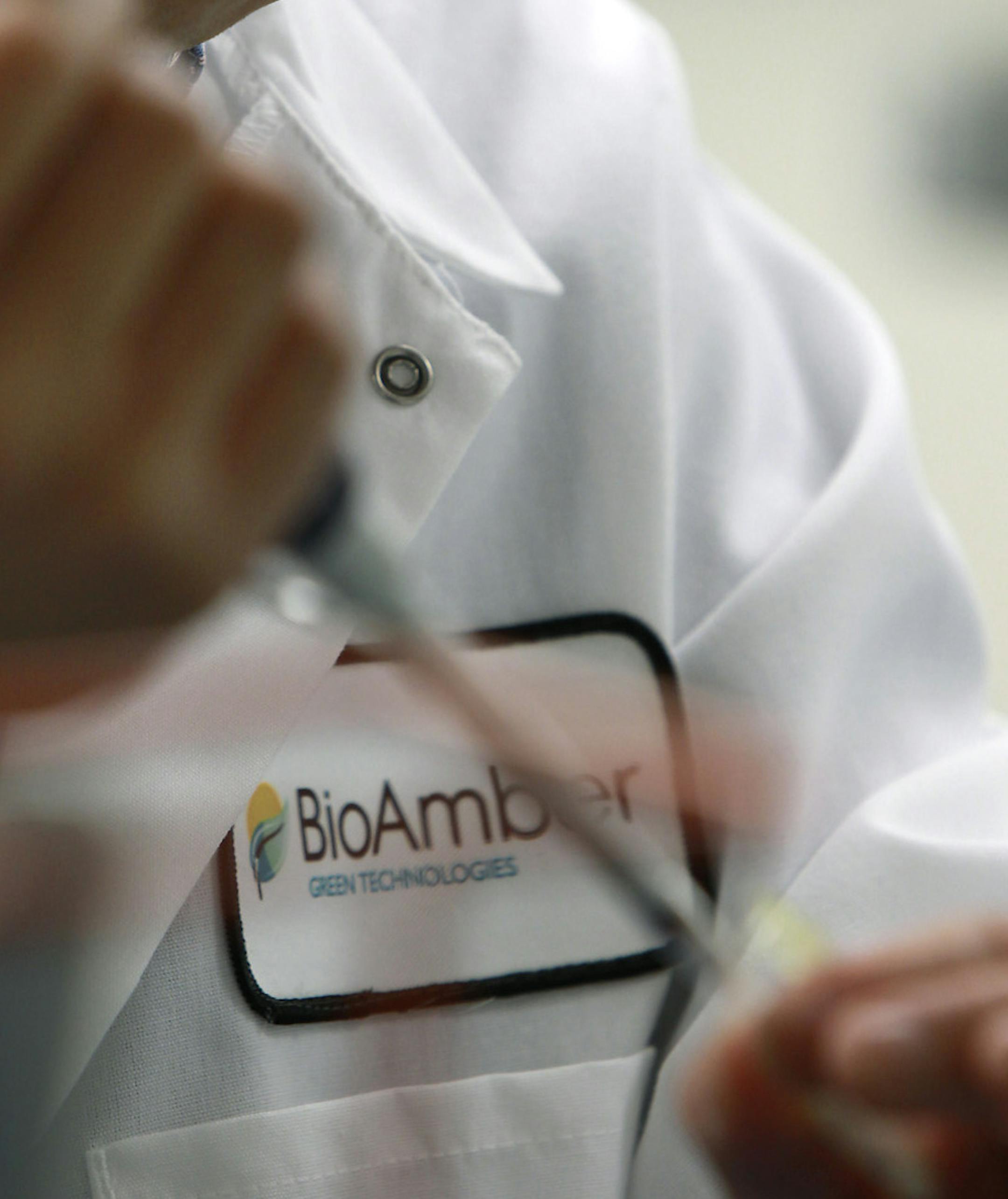 Kit Lau, a senior scientist at BioAmber, worked on a project at the company, Thursday, August 4, 2011 in Plymouth, MN. The Plymouth-based company raised $45 million in the second quarter.] (ELIZABETH FLORES/STAR TRIBUNE) ELIZABETH FLORES • eflores@startribune.com