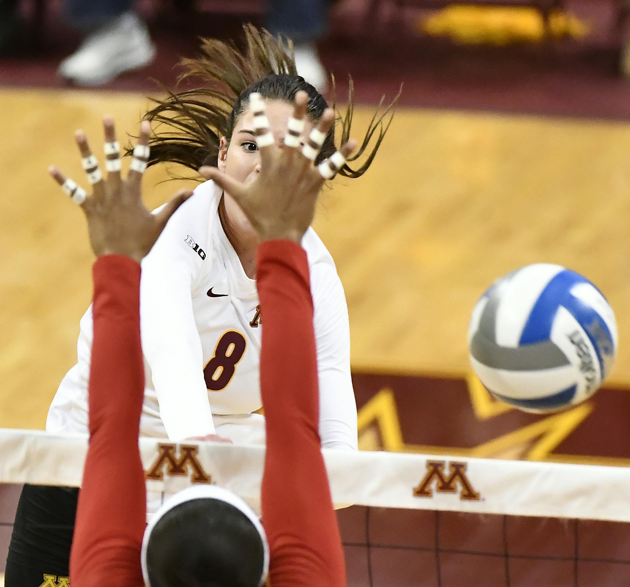 Minnesota outside hitter Sarah Wilhite (8) eyed her kill attempt in the first set against Nebraska. ] (AARON LAVINSKY/STAR TRIBUNE) aaron.lavinsky@startribune.com The University of Minnesota volleyball team played Nebraska on Wednesday, Nov. 23, 2016 at the University of Minnesota Sports Pavilion.
