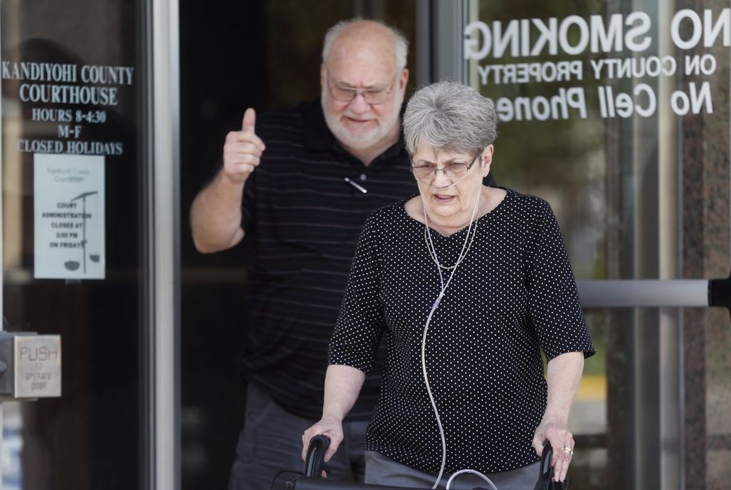 At the Kandiyohi Courthouse where Robert Warwick pleaded guilty to killing his grandmother, neighbors Don and Janet Dokken came out after the sentence with Don showing his approval.