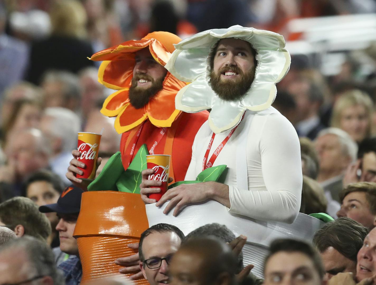 A pair of delicate flowers enjoyed the action in the first half. ] JERRY HOLT &#x2022; jerry.holt@startribune.com Auburn played Virginia in a semifinal of the NCAA Division I Men's Basketball Championship Final Four on Saturday, April 6, 2019 at U.S. Bank Stadium in Minneapolis.