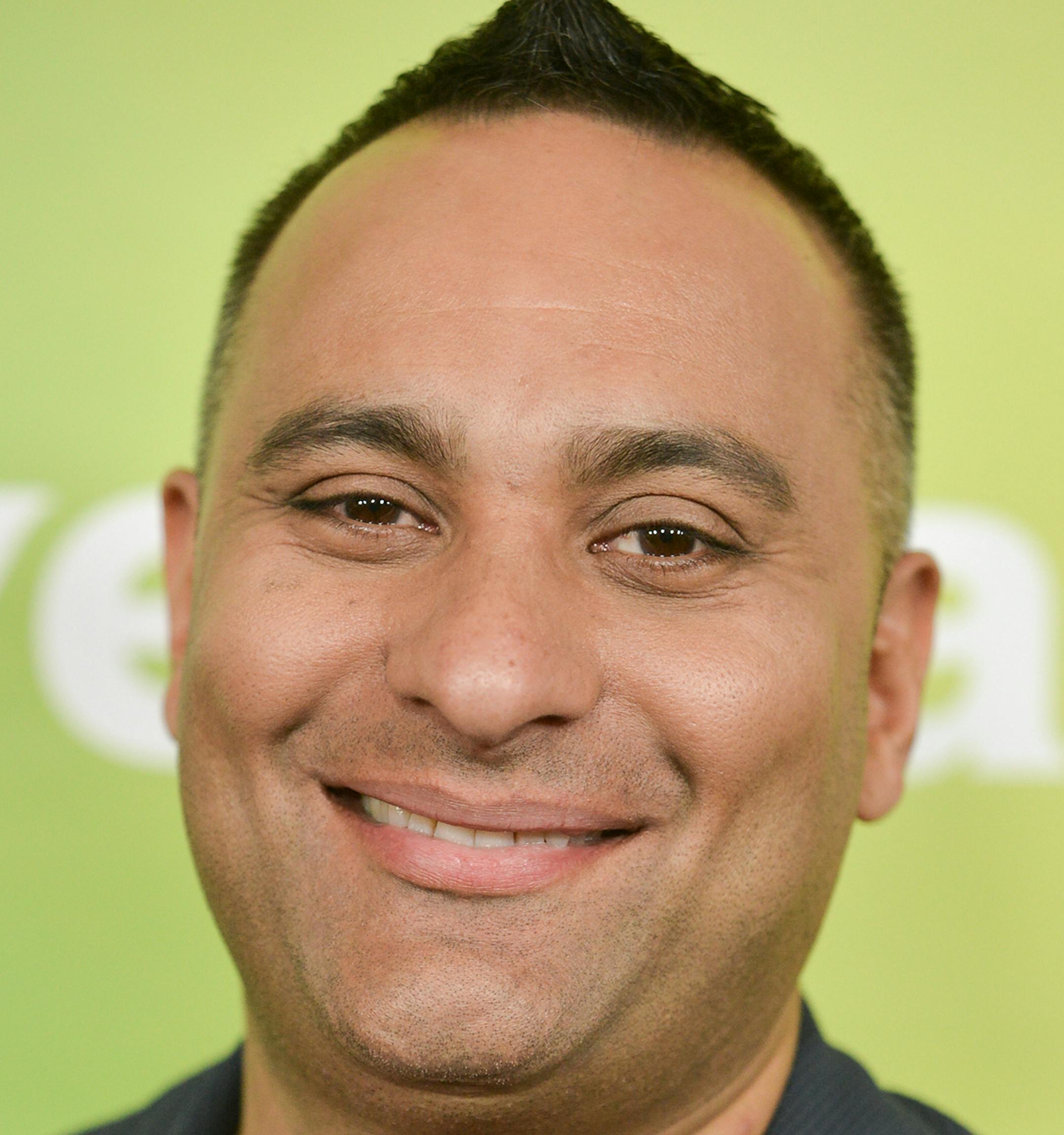 Russell Peters arrives at the NBC Universal Summer Press Day on Tuesday, April 8, 2014, in Pasadena, Calif. (Photo by Richard Shotwell/Invision/AP) ORG XMIT: INVW