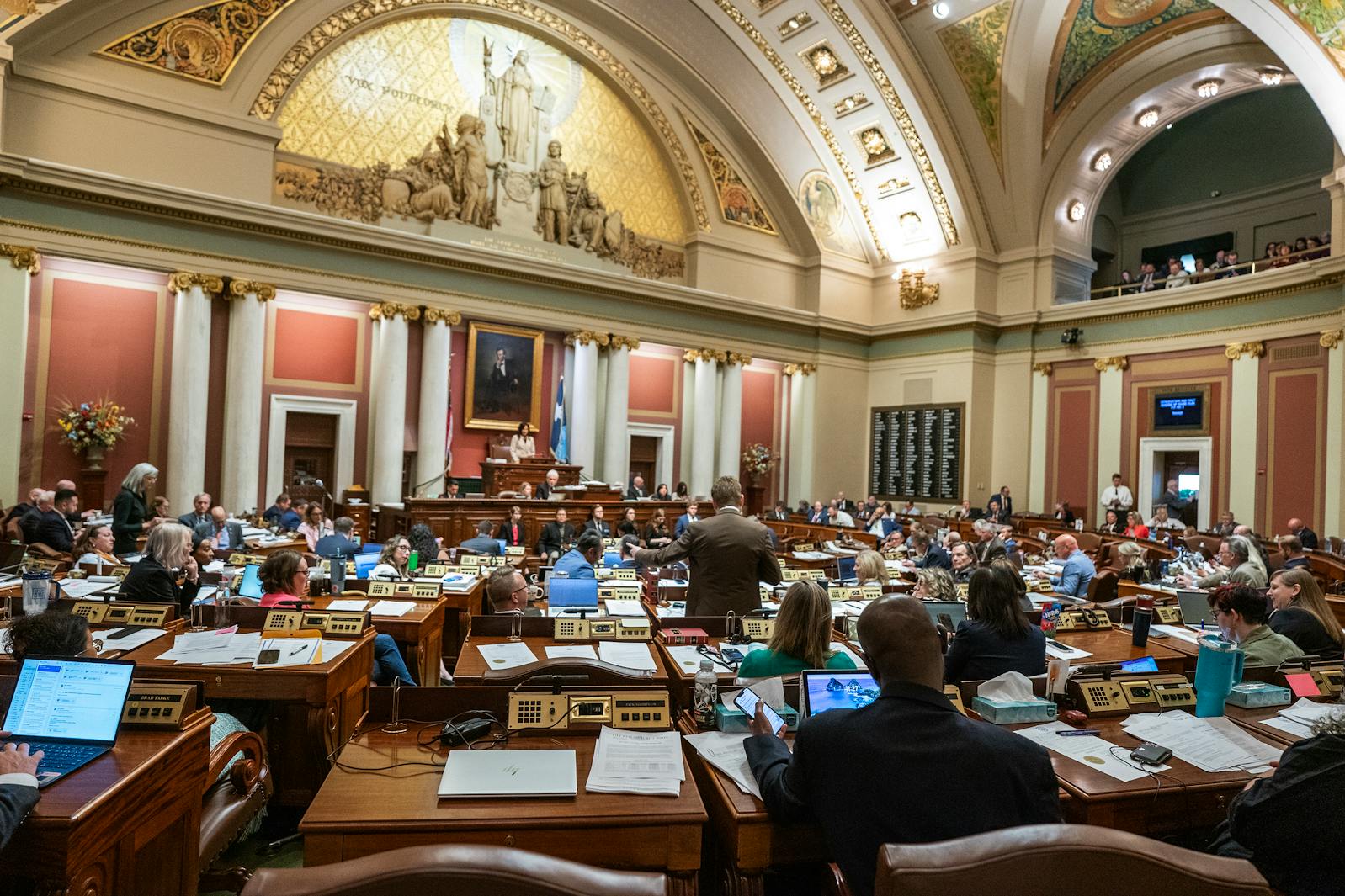 The House gathers for debate on bills at the State Capitol in St. Paul on Monday.