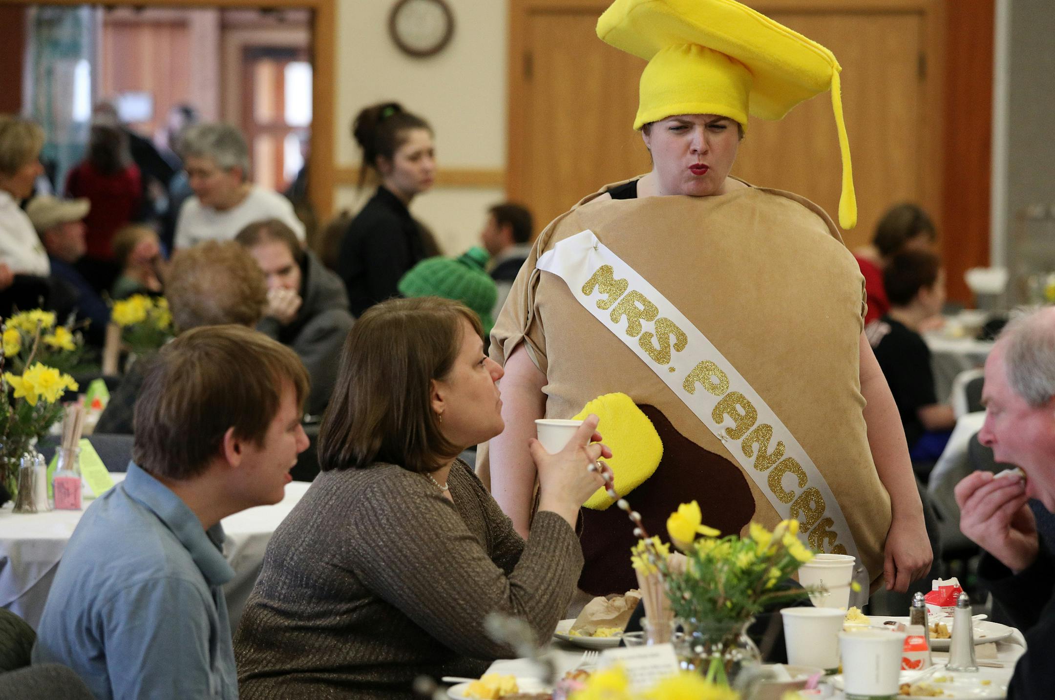 Alison Casey, the Arboretum's signature exhibits and events manager, visited tables dressed as "Mrs. Pancake" during the Arboretum's annual pancake breakfast. ] ANTHONY SOUFFLE ï anthony.souffle@startribune.com A surprisingly warm winter has sprung at the state's maple syrup production into life several weeks early at the Minnesota Landscape Arboretum in Chaska, Minn. The Arboretum recorded the earliest sap tap date yet. They sponsor several educational programs that explain the process of