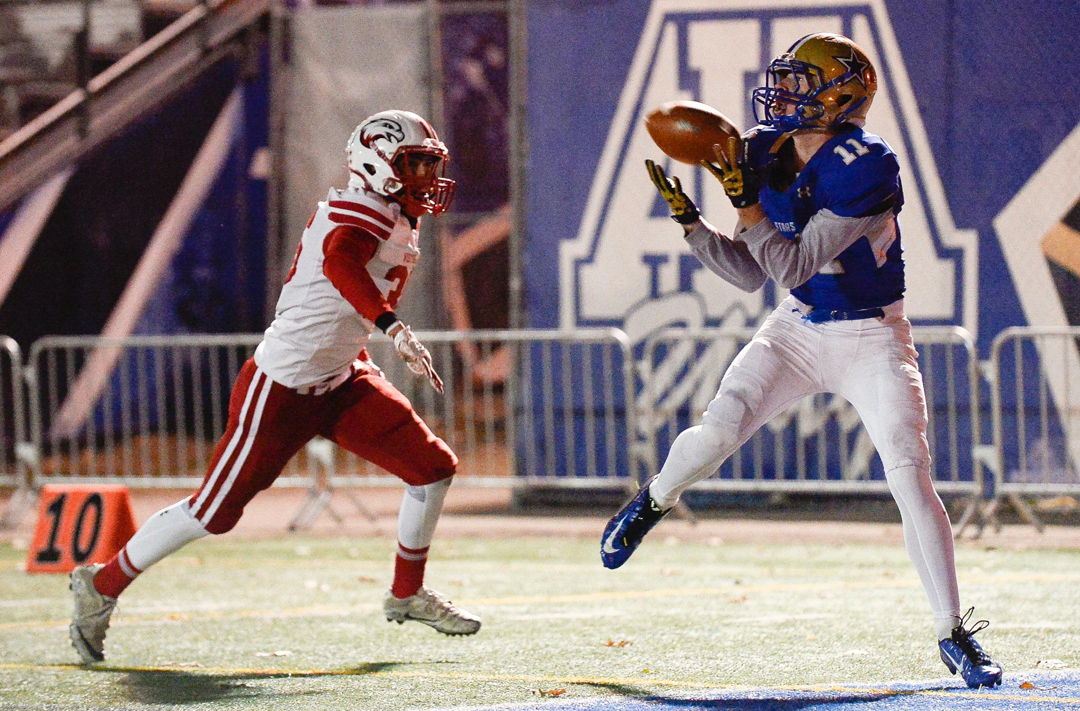 Holy Angels wide receiver John Kosmach (11) made a touchdown catch in the first half against Mound Westonka as he was trailed from behind by defensive back Sam Dufault (36). ] AARON LAVINSKY &#xef; aaron.lavinsky@startribune.com Mound Westonka played Holy Angels in a Class 4A playoff football game on Saturday, Oct. 28, 2017 at Academy of Holy Angels in Richfield, Minn.