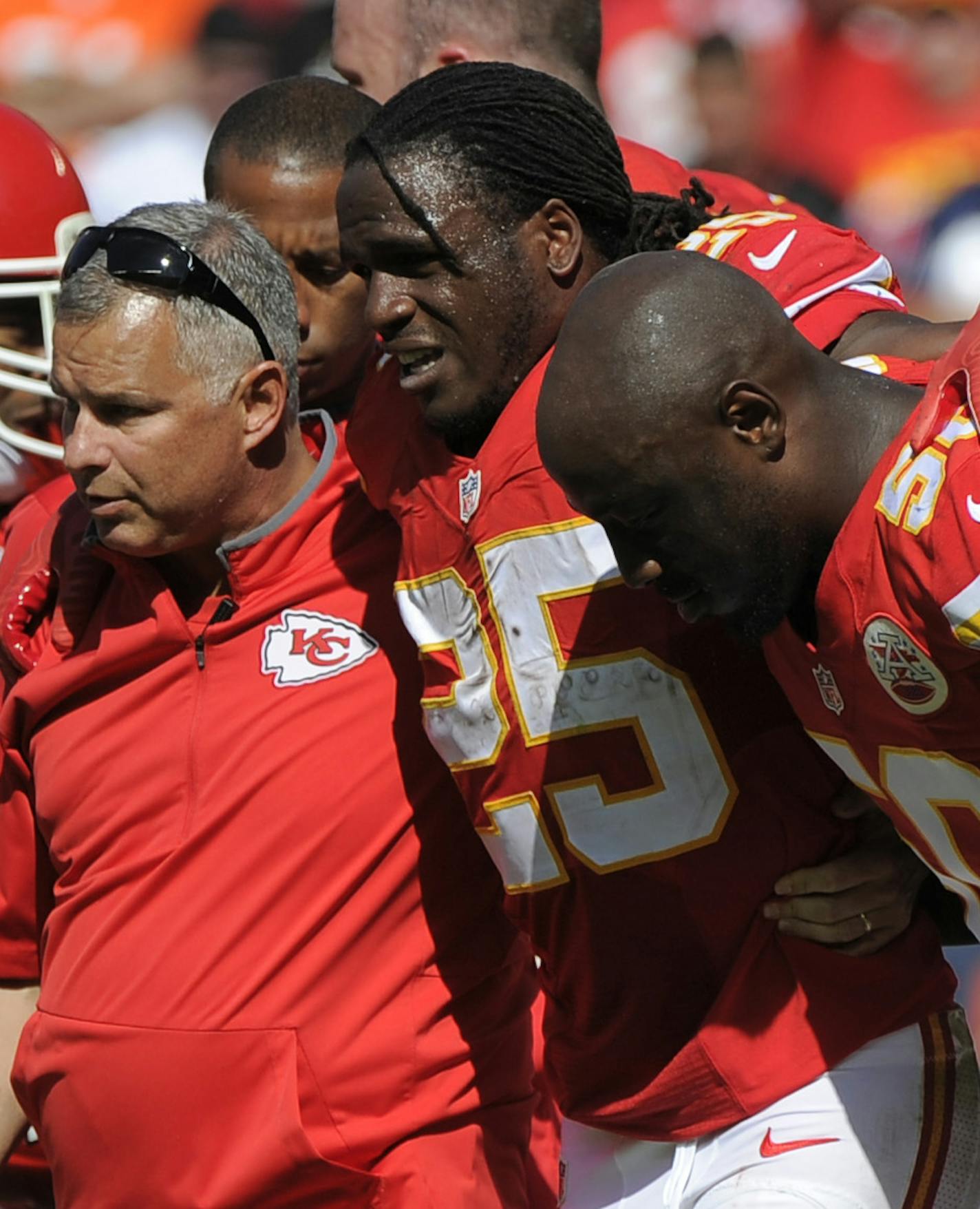 Kansas City Chiefs running back Jamaal Charles (25) is helped off the field after an injury in the second half of an NFL football game against the Chicago Bears in Kansas City, Mo., Sunday, Oct. 11, 2015. (AP Photo/Ed Zurga)