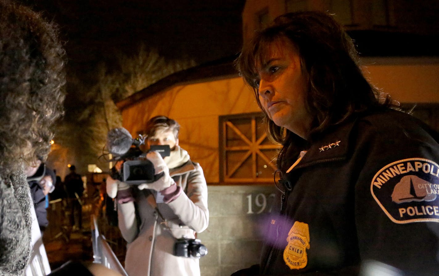 Minneapolis Police Chief Janee Harteau was asked about police complaints by Black Lives Matter organizer Mica Grimm in front of the Minneapolis Fourth Precinct. ] (KYNDELL HARKNESS/STAR TRIBUNE) kyndell.harkness@startribune.com Protesters in front of Minneapolis Fourth Precinct in Minneapolis Min., Friday November 20, 2015. ORG XMIT: MIN1511202112120068