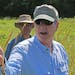 Infectious disease specialist Dr. Michael Osterholm of the University of Minnesota explains his trout stream rehabilitation methods at Prairie Song Fa
