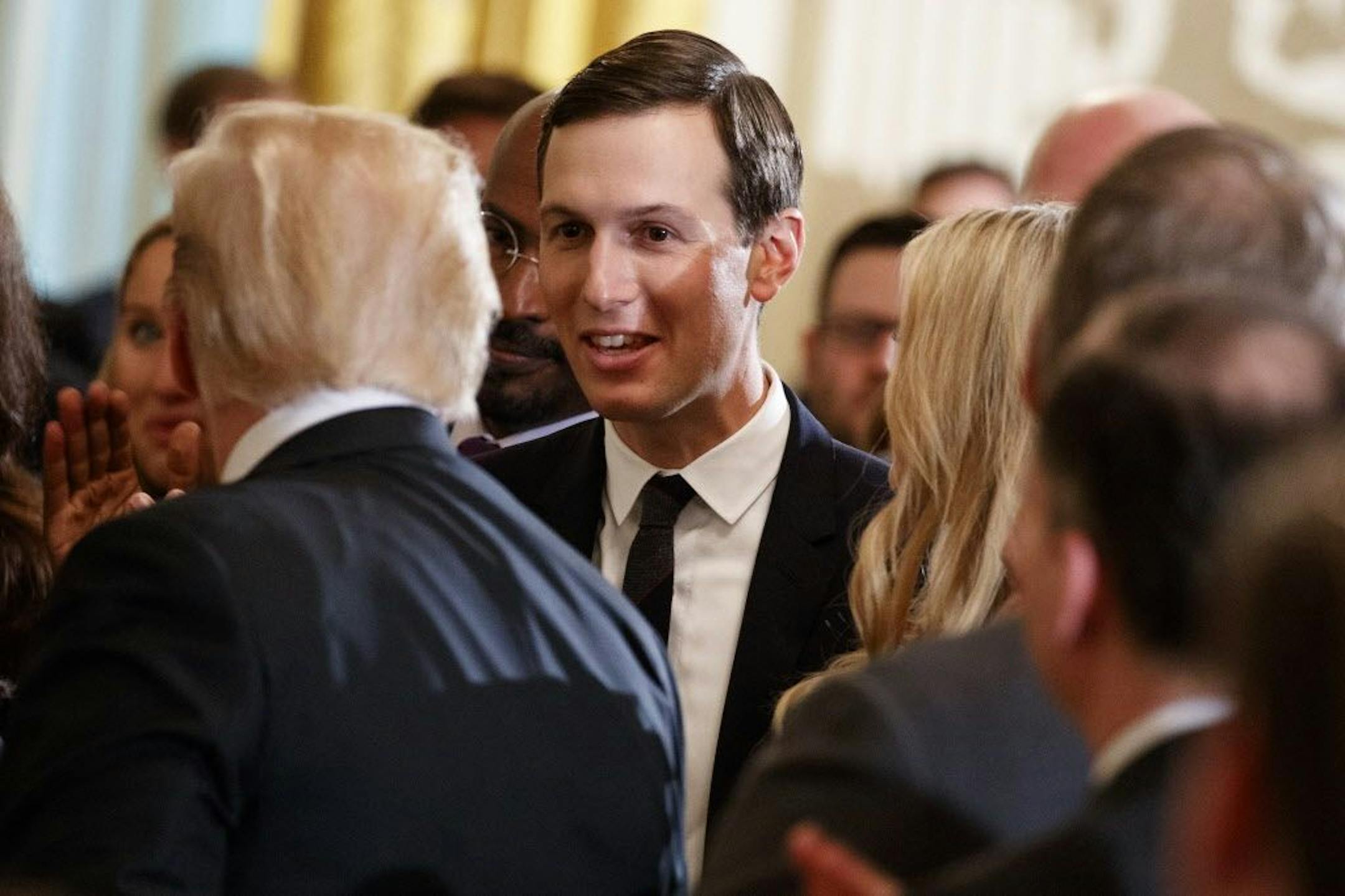 White House senior adviser Jared Kushner shakes hands with President Donald Trump during an event on prison reform in the East Room of the White House, Friday, May 18, 2018, in Washington.
