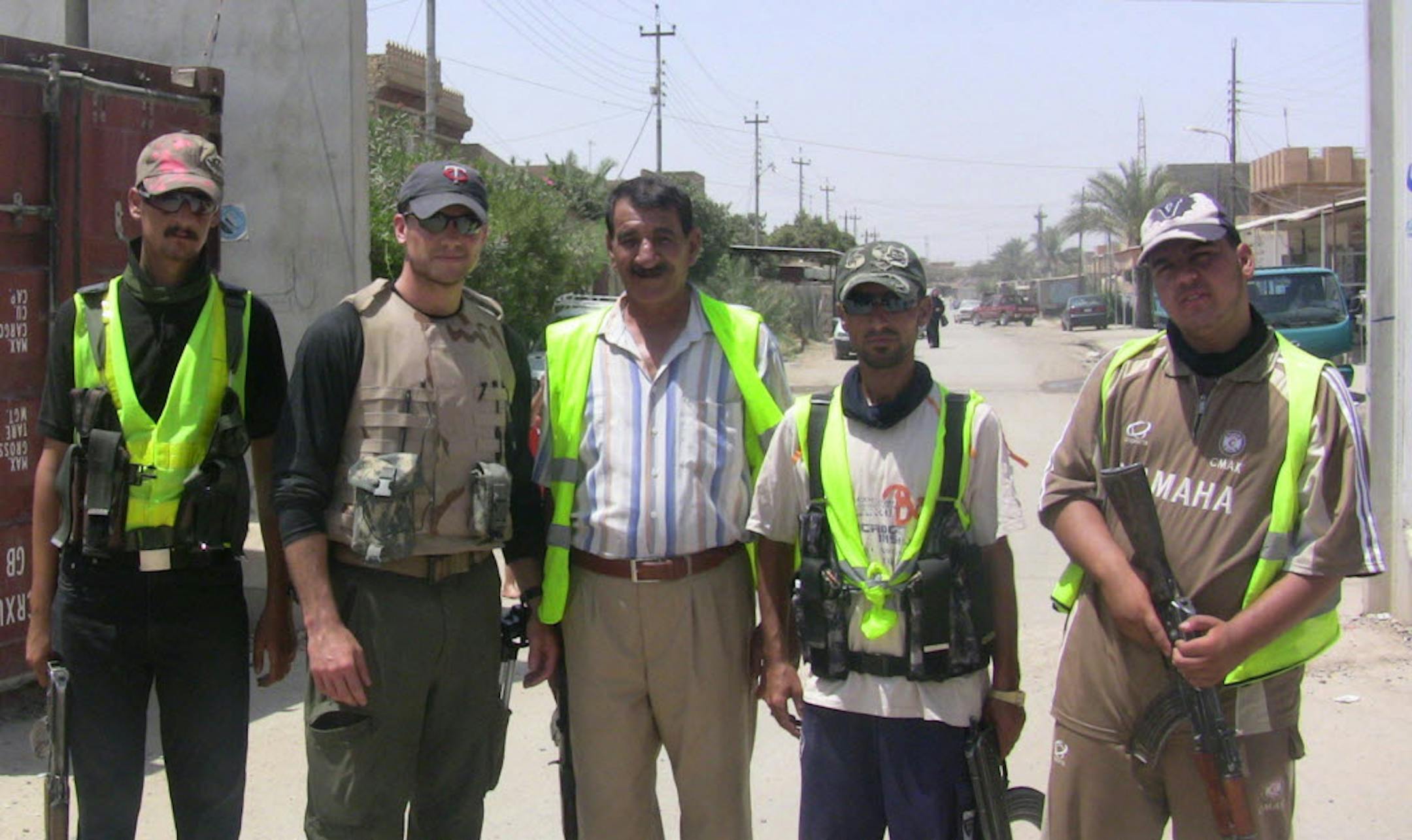 Pete Hegseth with Sons of Iraq outside "Safe Neighborhood" in Samarra.