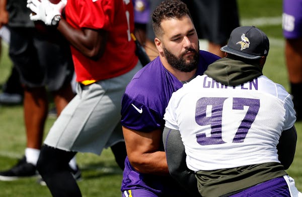 Vikings starting left tackle Matt Kalil, left, left the practice field early Sunday because of an apparent leg injury, walked to the locker room, didn