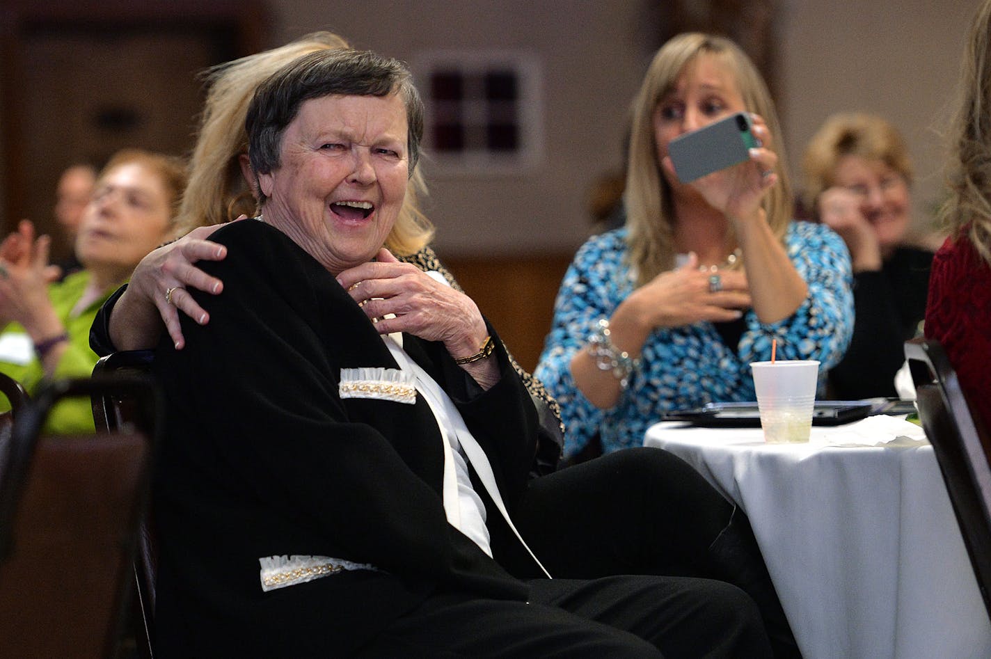 Long-serving former school board member, Arlene Bush reacts following the announcement Vice Chair of Bloomington School Board's Maureen Bartolotta that the board room of the district office will be renamed the Arlene Bush Board Room. ] (SPECIAL TO THE STAR TRIBUNE/BRE McGEE) **Arlene Bush