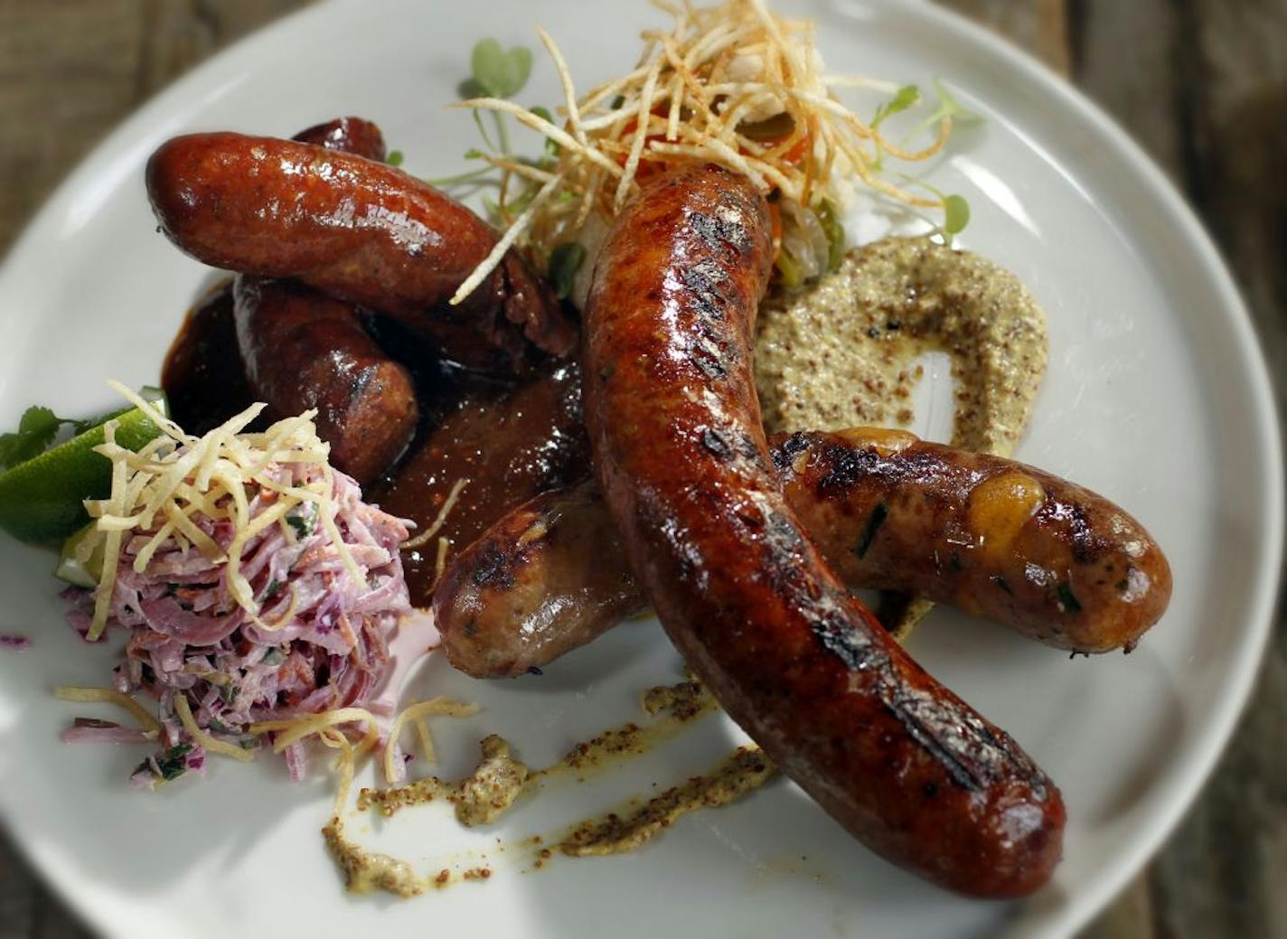 Butcher & the Boar specializes in house-made sausages. Here, a sampling of beef, pork and boar sausages.