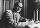 American writer Thornton Wilder working in his Berlin hotel room immediately after his arrival on May 16, 1931. (AP Photo) ORG XMIT: APHS90804