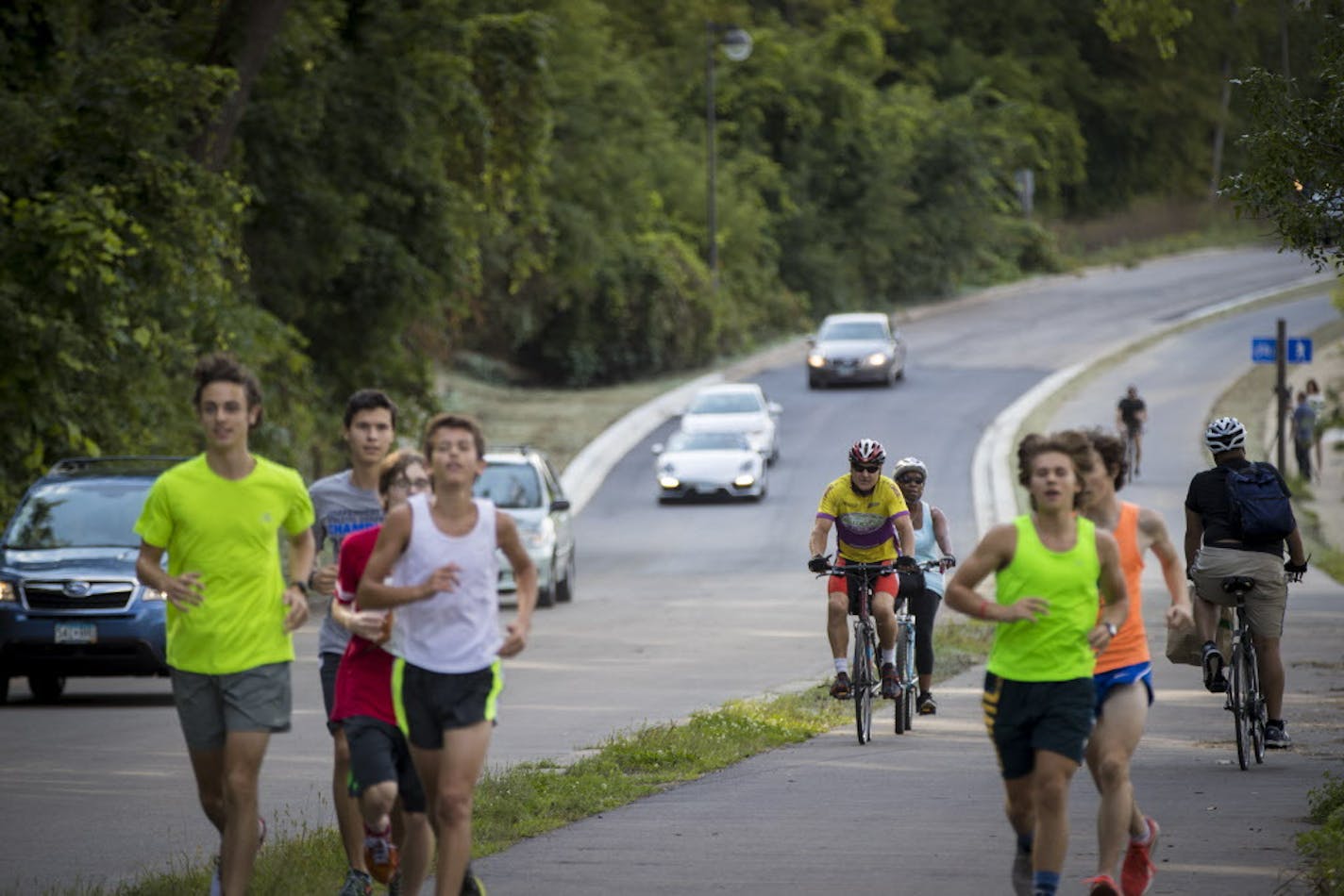 Bicyclists, runners and drivers took advantage of West River Road in Minneapolis last fall.