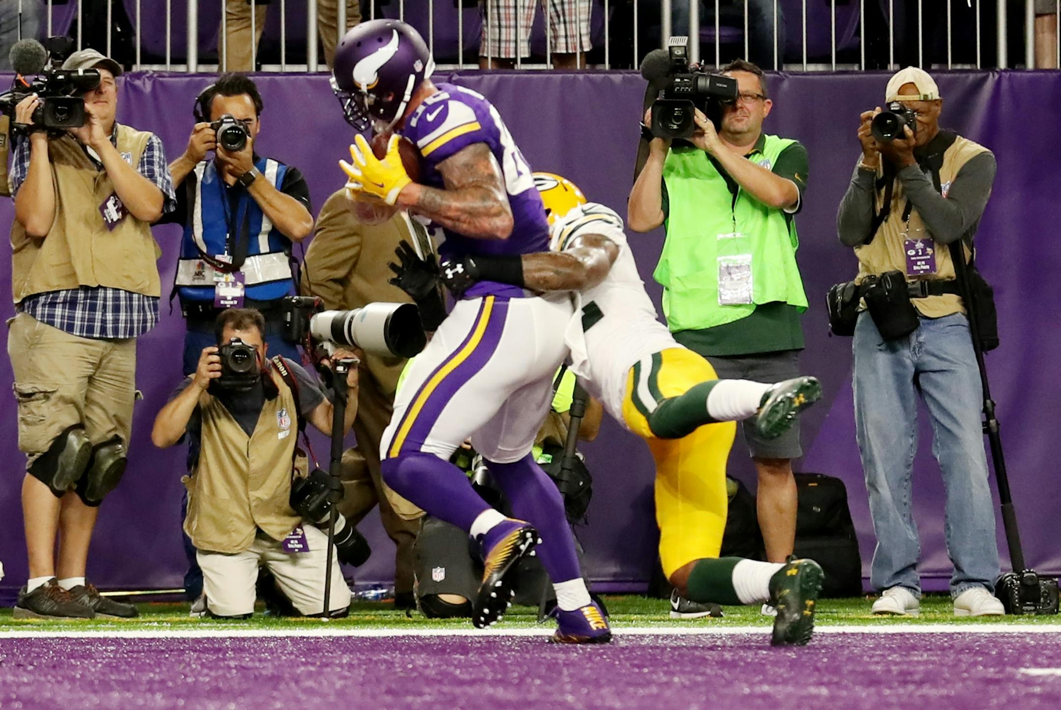 Vikings Kyle Rudolph scores the Vikings 1st TD in the 2nd quarter. The Minnesota Vikings open the new US Bank Stadium for their first home regular season game against the Green Bay Packers. Here,