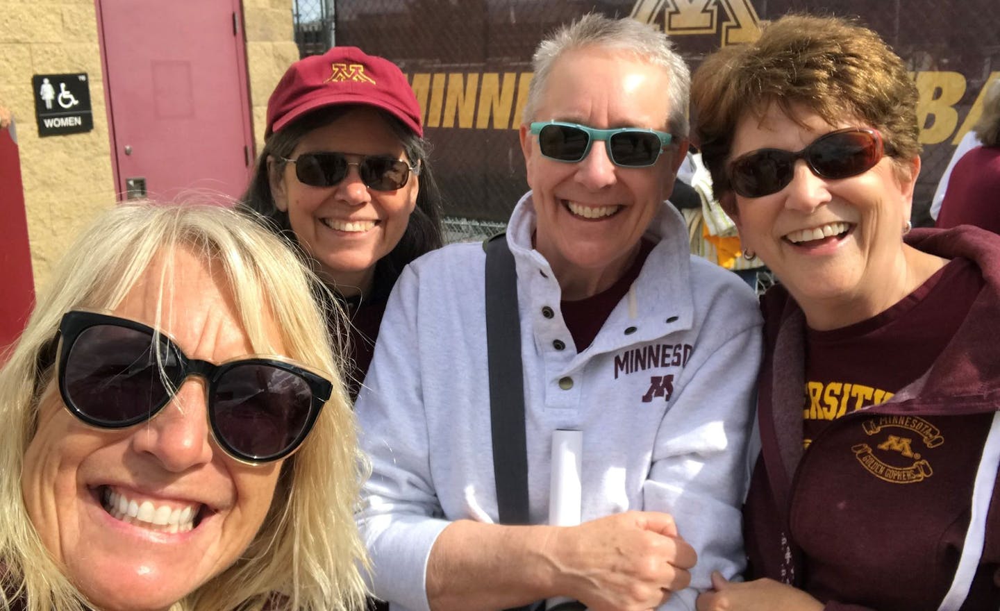 University of Minnesota alums, from left: Beth Biersdorf, Karen Hawley, Lee Biersdorf (a Gophers Softball player from 1976-1979) and Char Tolkien.